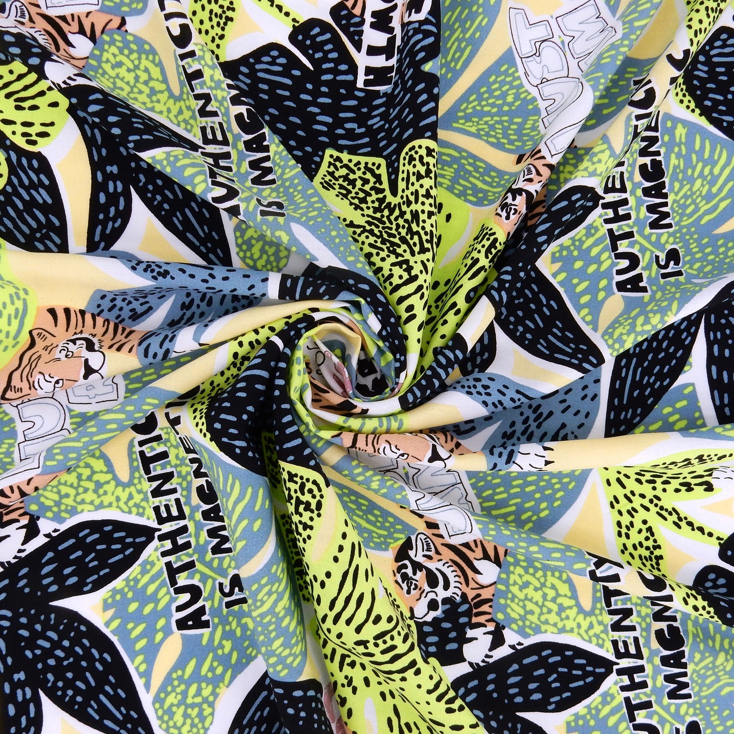 Premium 100% Rayon Challis Fabric. African-inspired print Lime Green. light weight, ultra soft, silk like texture. shown swirled