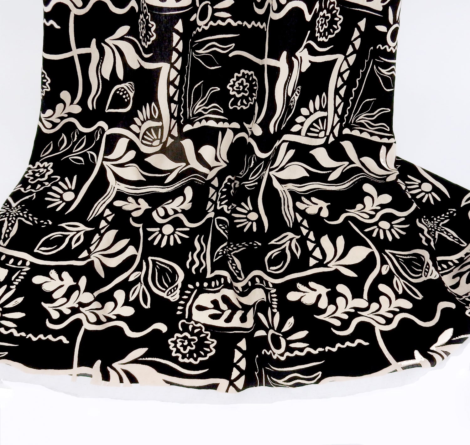 Premium 100% Rayon Challis Fabric. Hand Block Style Print in Black and Beige. Light weight, ultra soft, silk like texture. shown draped