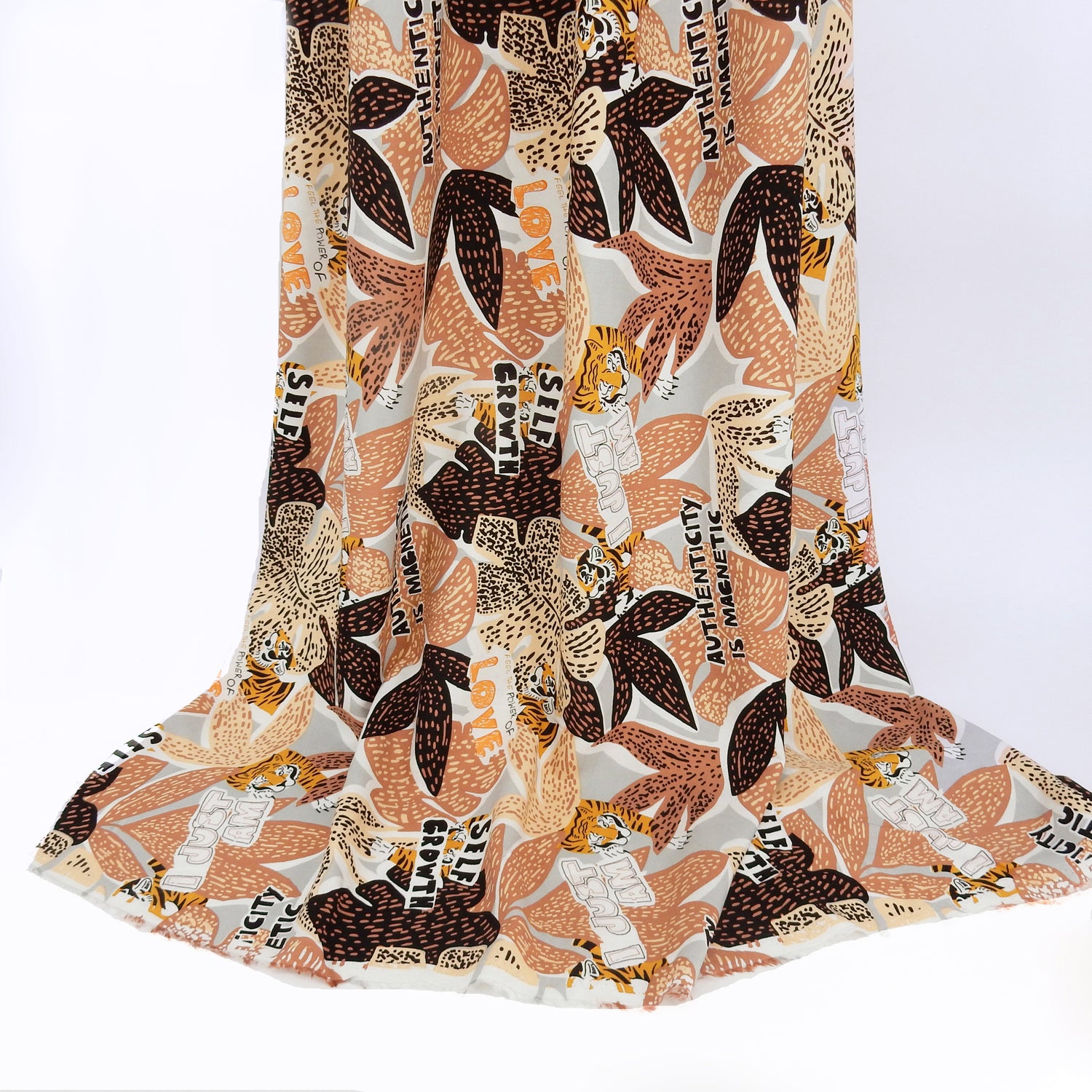 Premium 100% Rayon Challis Fabric. African-inspired print , gray, coral & brown. light weight, ultra soft, silk like texture. shown draped