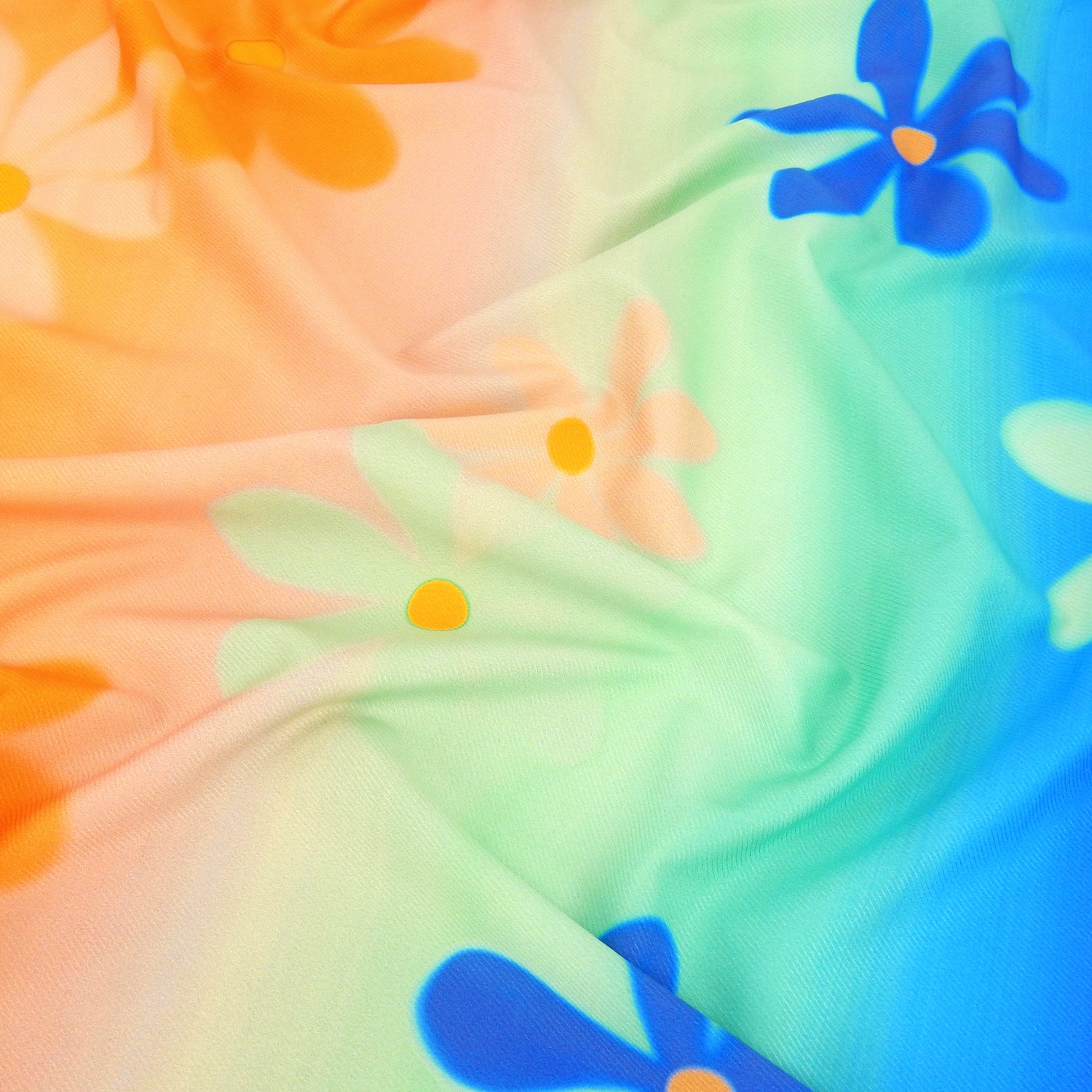 Premium Spanish Floral Twill Dress Fabric. Modern multicolored Vertical Railroaded Stripe with floral design printed on dress weight polyester spandex twill. shown lightly gathered
