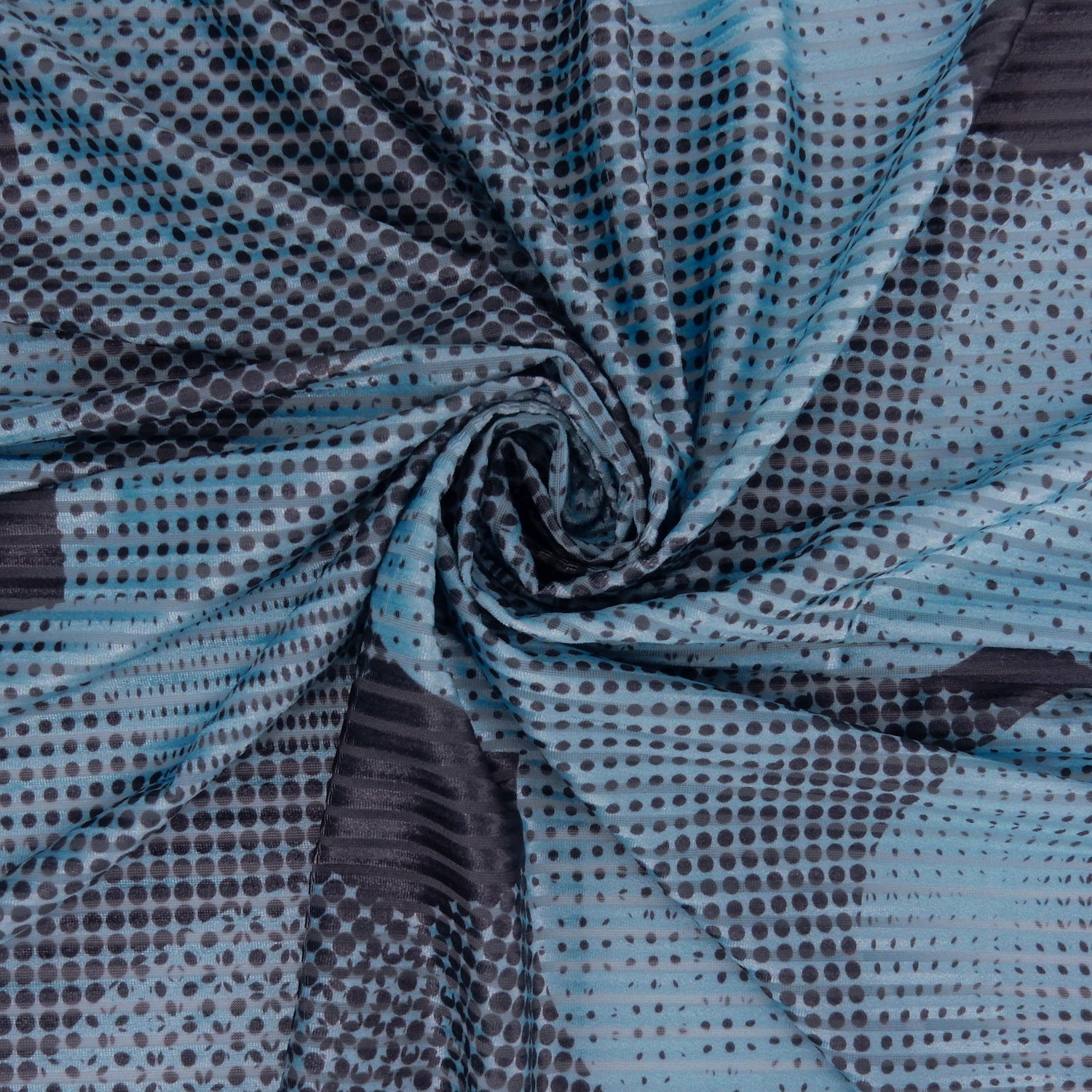 Premium Spanish Geometric Velvet Burnout Stretch Fabric. Elegant Dusty Blue Dotted circle design on 4-way stretch burnout velvet. shown swirled