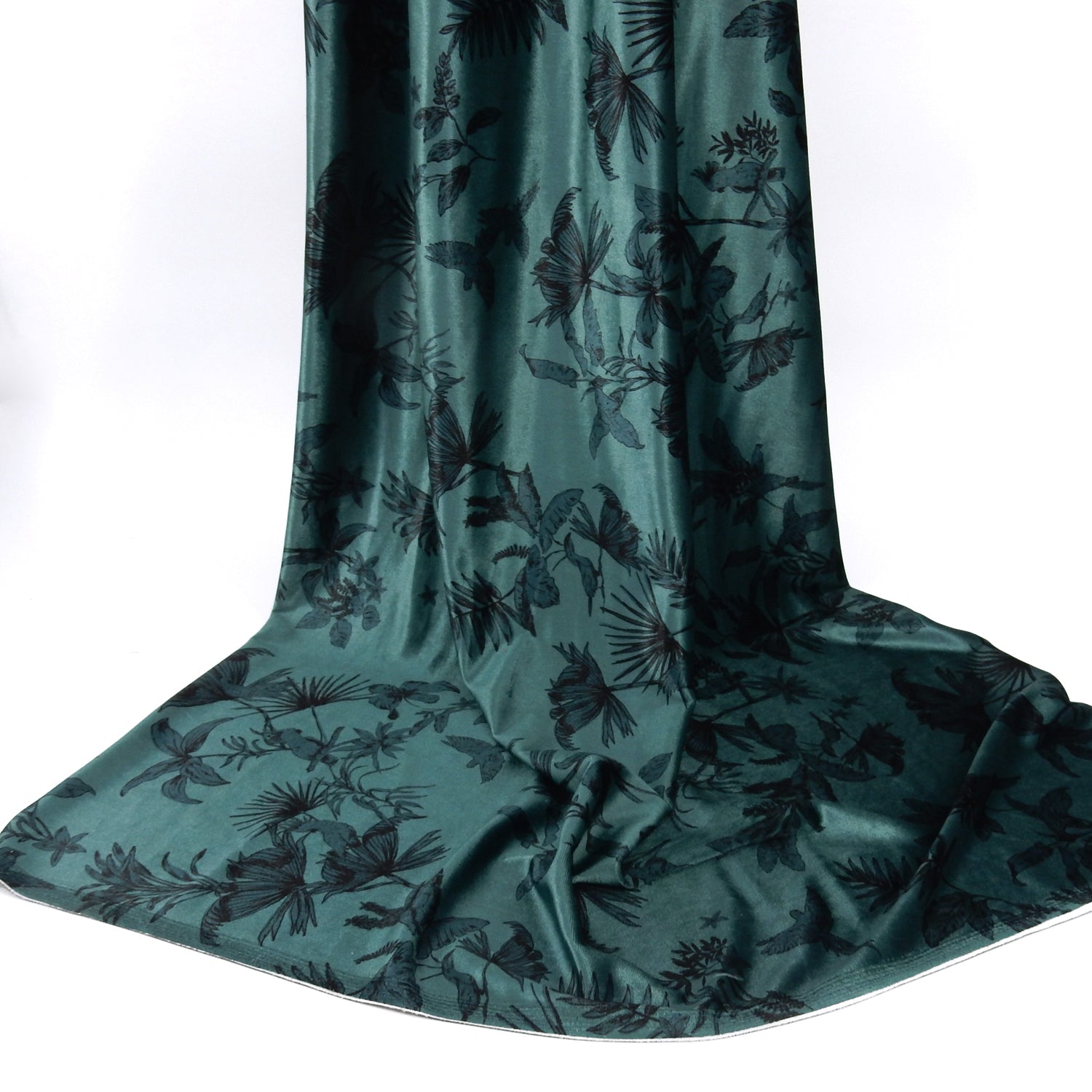 Premium Spanish minimalist floral stretch velvet dress fabric. Luxury Tone-on-Tone Teal design on polyester spandex velvet. Shown draped