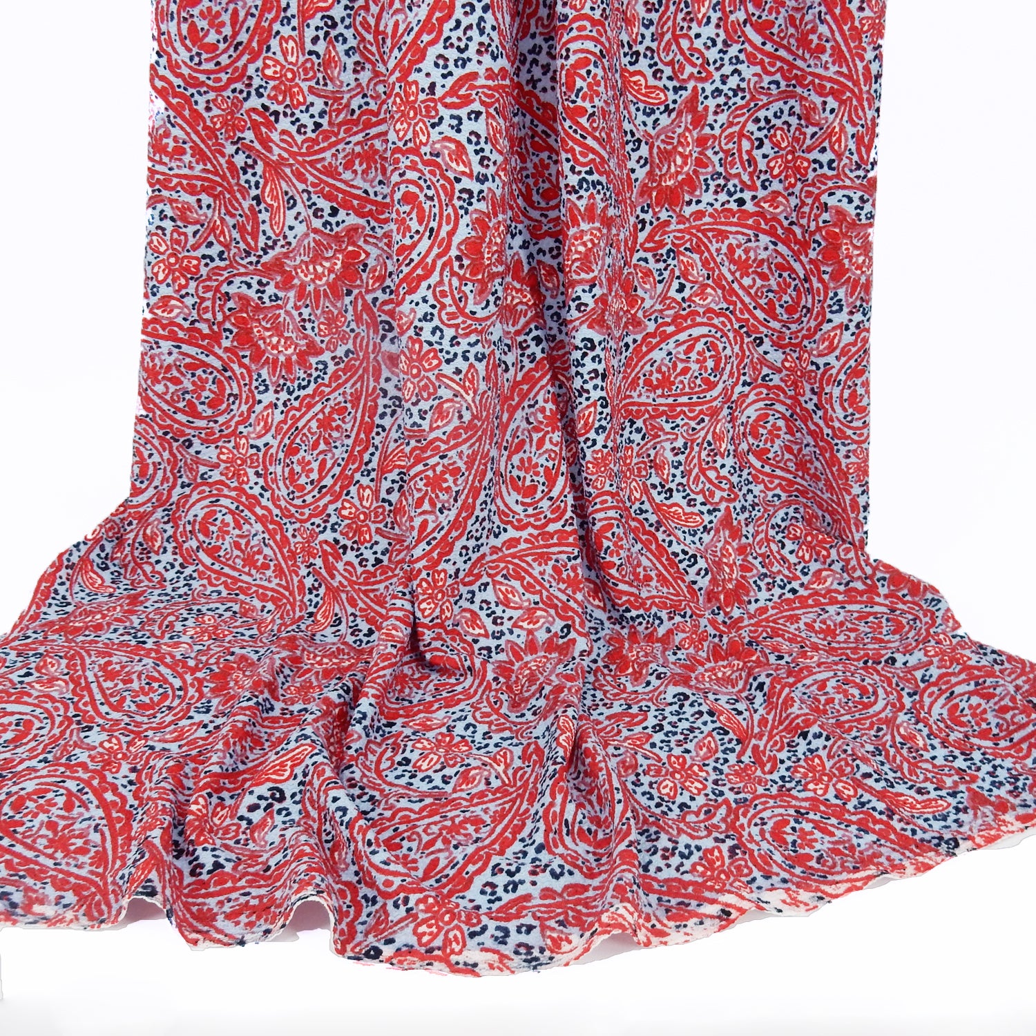 Premium textured stretch jacquard dress fabric. Luxury lightweight polyester spandex blend. Red & sky blue paisley design. shown draped