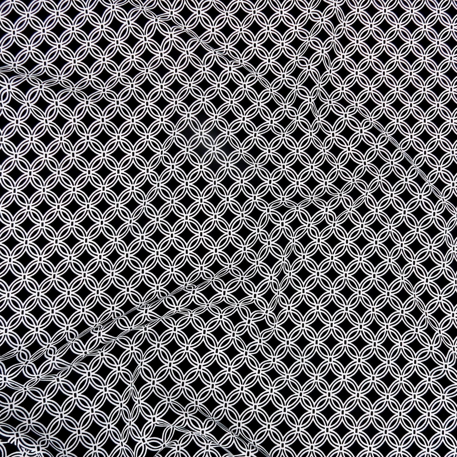 Black & White Geometric Circular Grid – Silky Smooth Stretch Dress Fabric CLF1-856