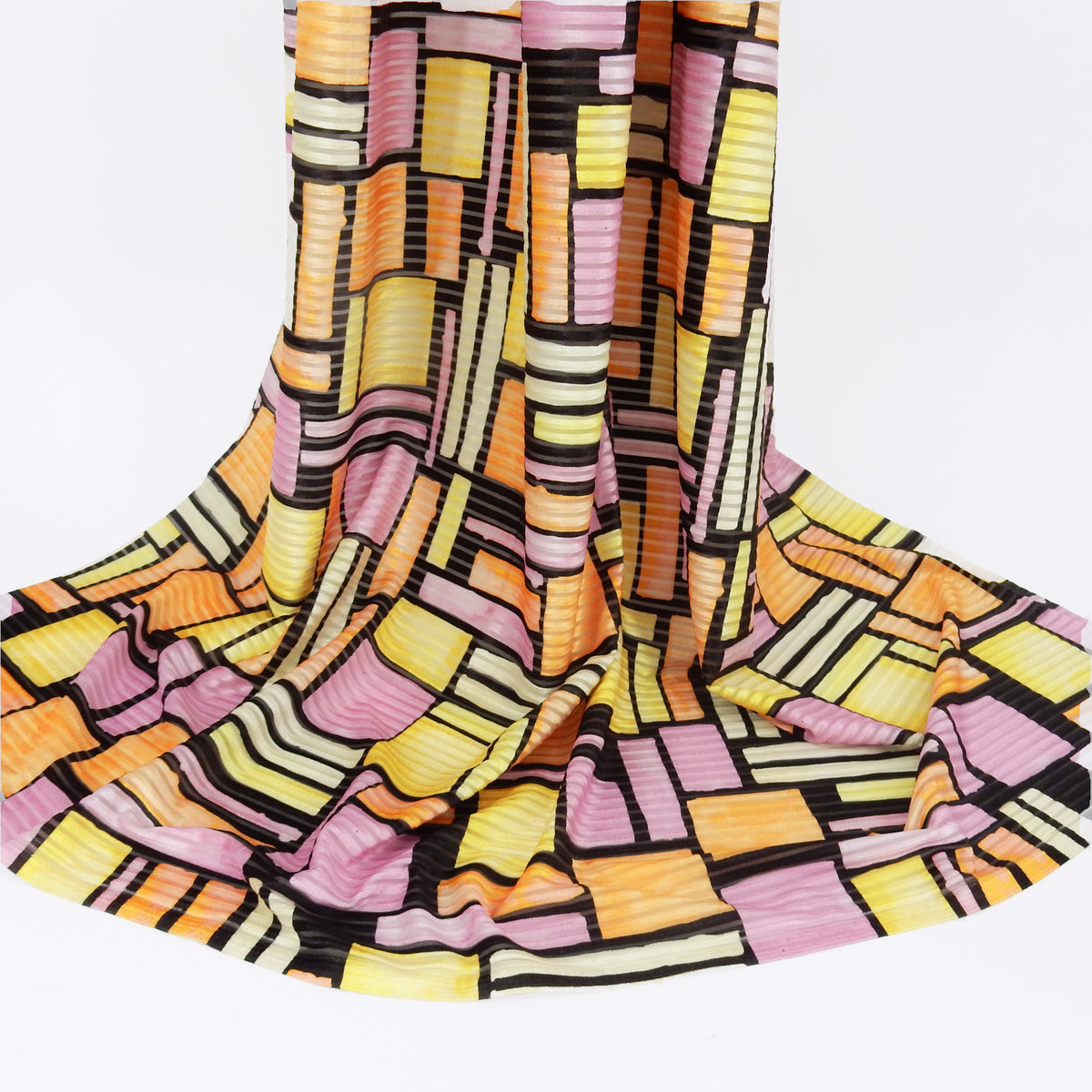 Premium Spanish Geometric Burnout Stretch Velvet fabric. Lemon Yellow, Soft Orange, Paris Pink, Ivory & Black. 4-way stretch. shown draped