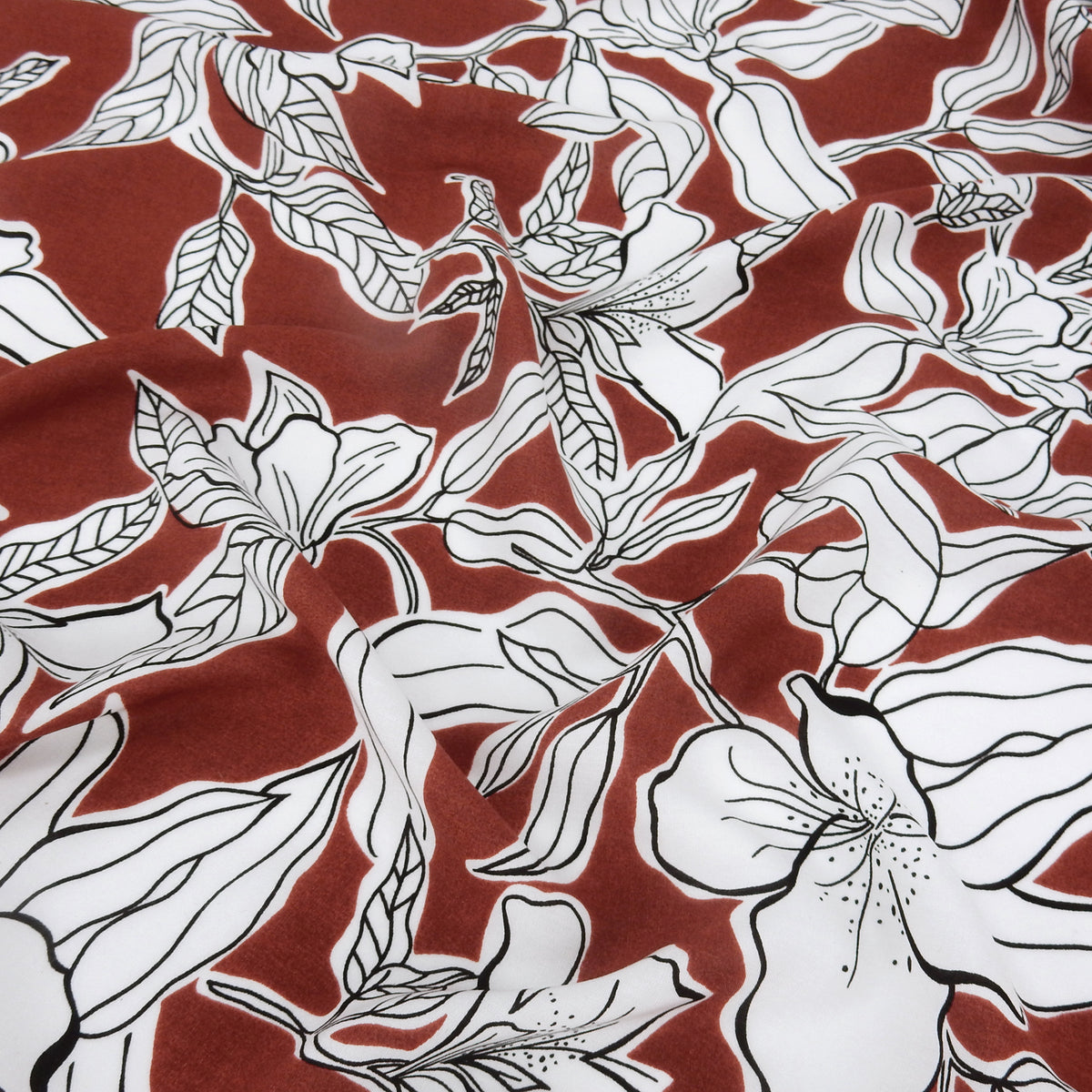 Premium 100% Rayon Challis Fabric. Minimalist White Lily in Deep Rust & Crisp White. lightweight & ultra soft. shown lightlygathered
