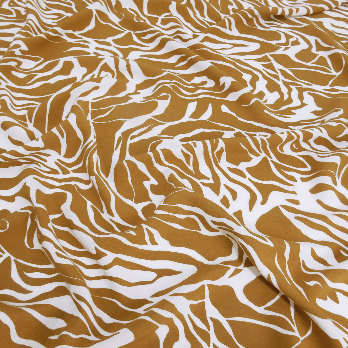 Premium 100% Rayon Challis Fabric. Modern Abstract Zebra Marbled Print in Earthy Taupe & White. lightweight & ultra soft. shown lightly gathered