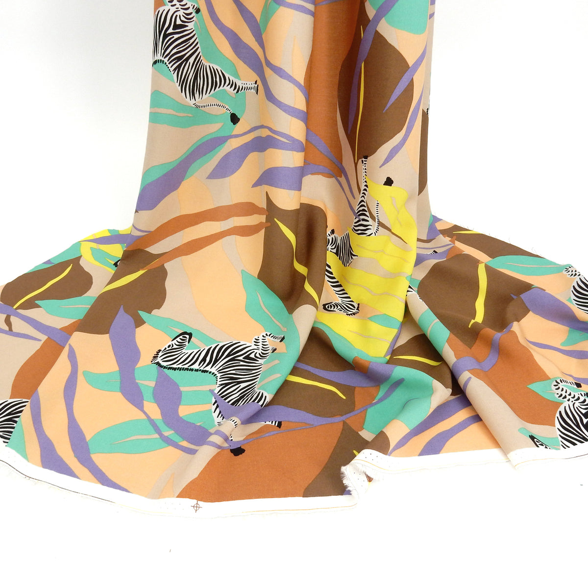 Premium 100% Rayon Challis Fabric. Artistic Zebra Safari Print in Peach, Taupe, Lavender, Beige & Yellow. lightweight & ultra soft. shown draped
