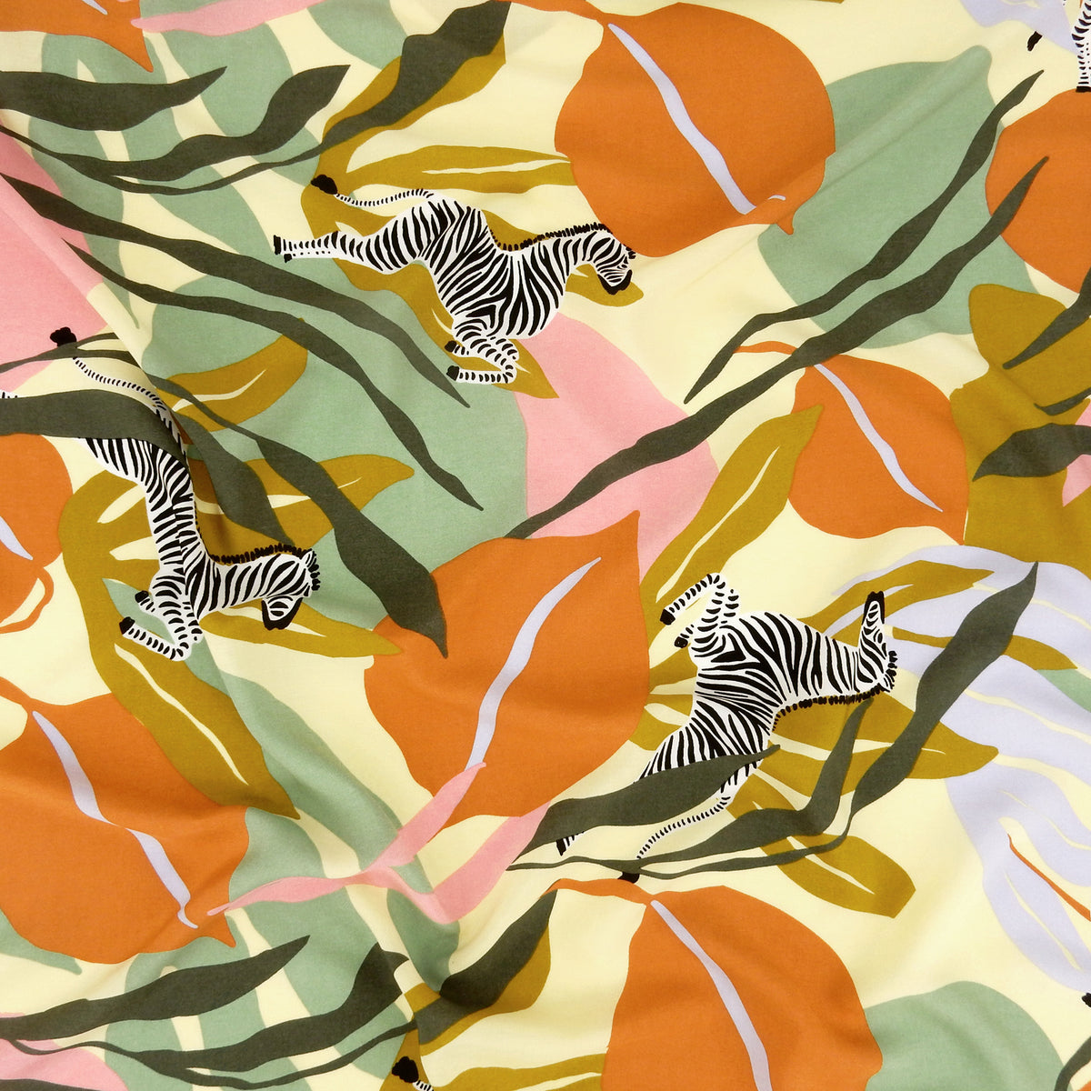 Premium 100% Rayon Challis Fabric. Artistic Zebra Safari Print in Terracotta, Sage & Soft Cream. lightweight & ultra soft. shown lightly gathered