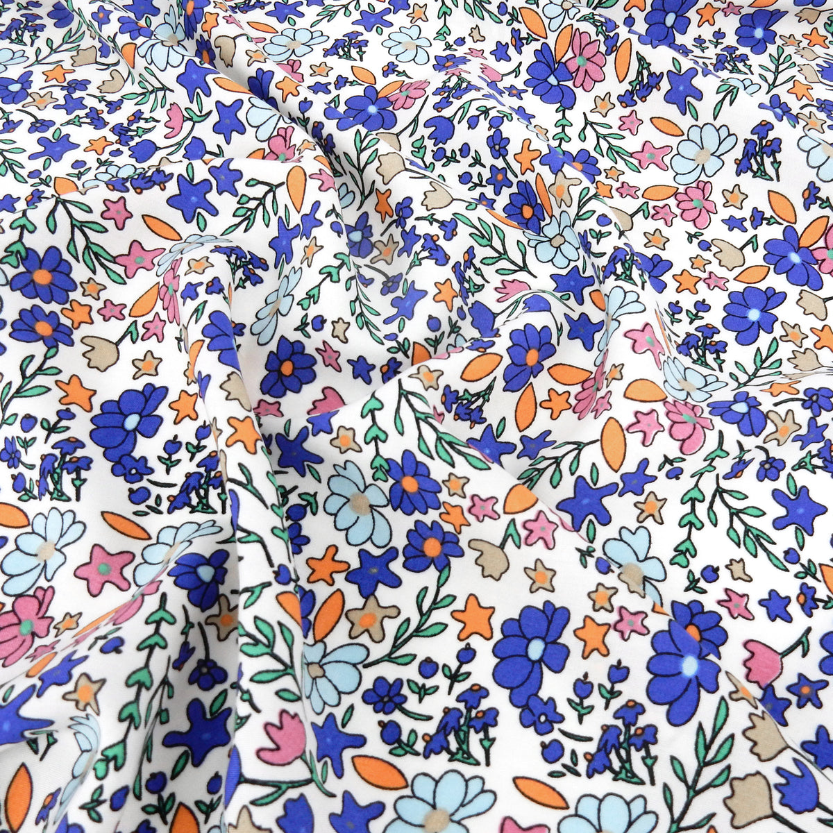 Premium 100% Rayon Challis Fabric. Playful Millefleurs Floral in Periwinkle, Berry & Coral. lightweight & ultra soft. shown lightly gathered