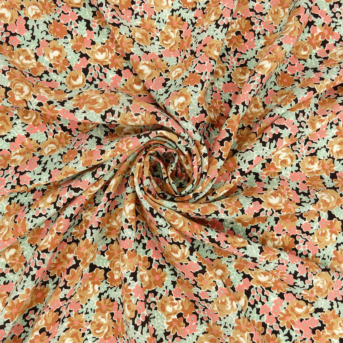 Premium 100% Rayon Challis Fabric. Midnight Millefleurs Floral in Beige, Rose & Mint Green. lightweight & ultra soft. shown swirled