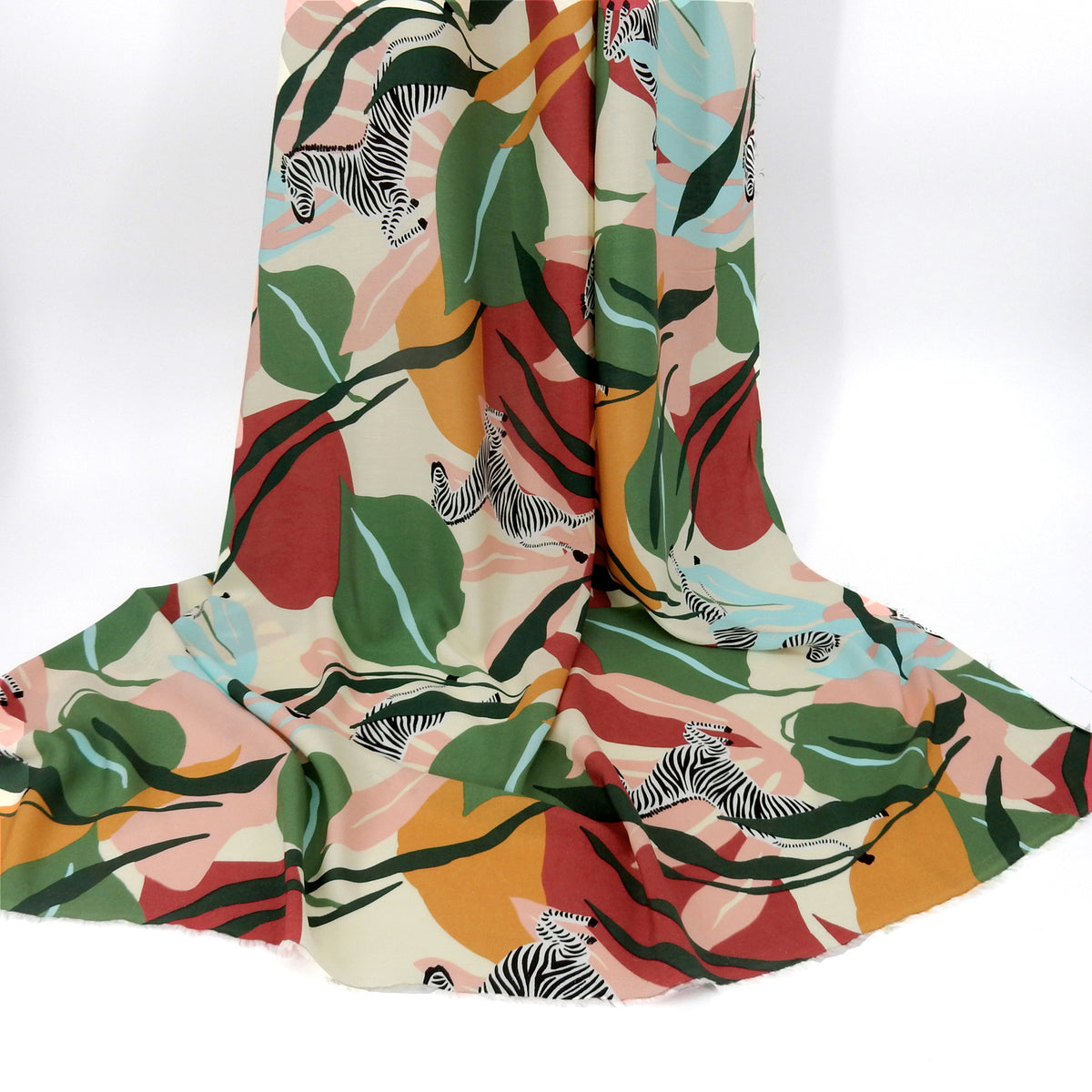 Premium 100% Rayon Challis Fabric. Artistic Zebra Safari Print in Pale Wine, Hunter & Sage Green. lightweight & ultra soft. Shown draped