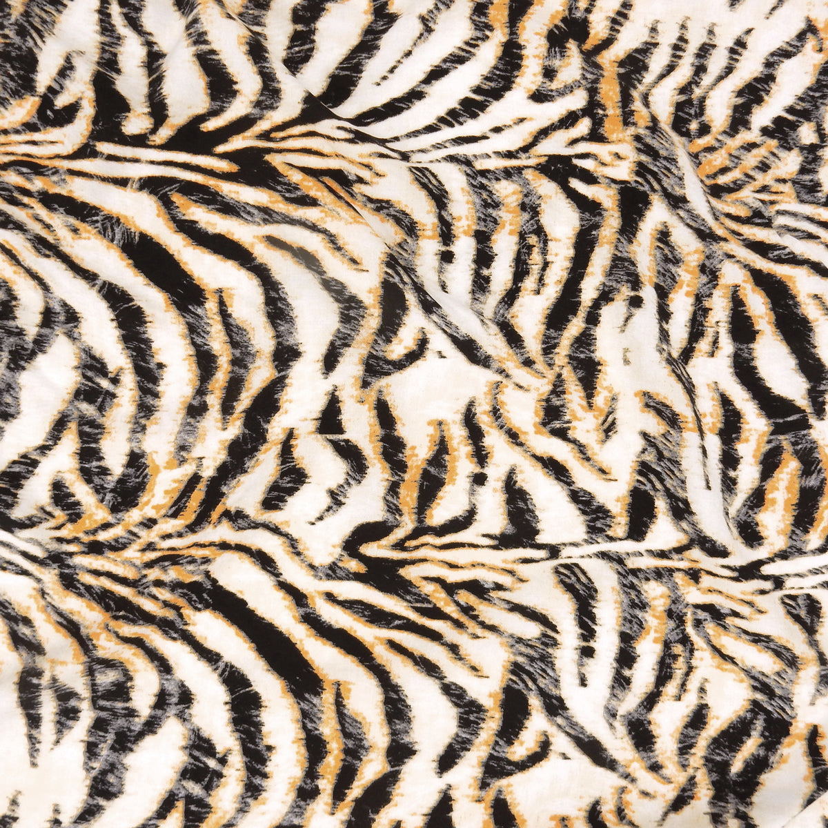 Premium 100% Rayon Challis Fabric. Artistic Tiger Stripe Print in Soft Orange, Charcoal & Creamy White. lightweight & ultra soft. shown lightly gathered