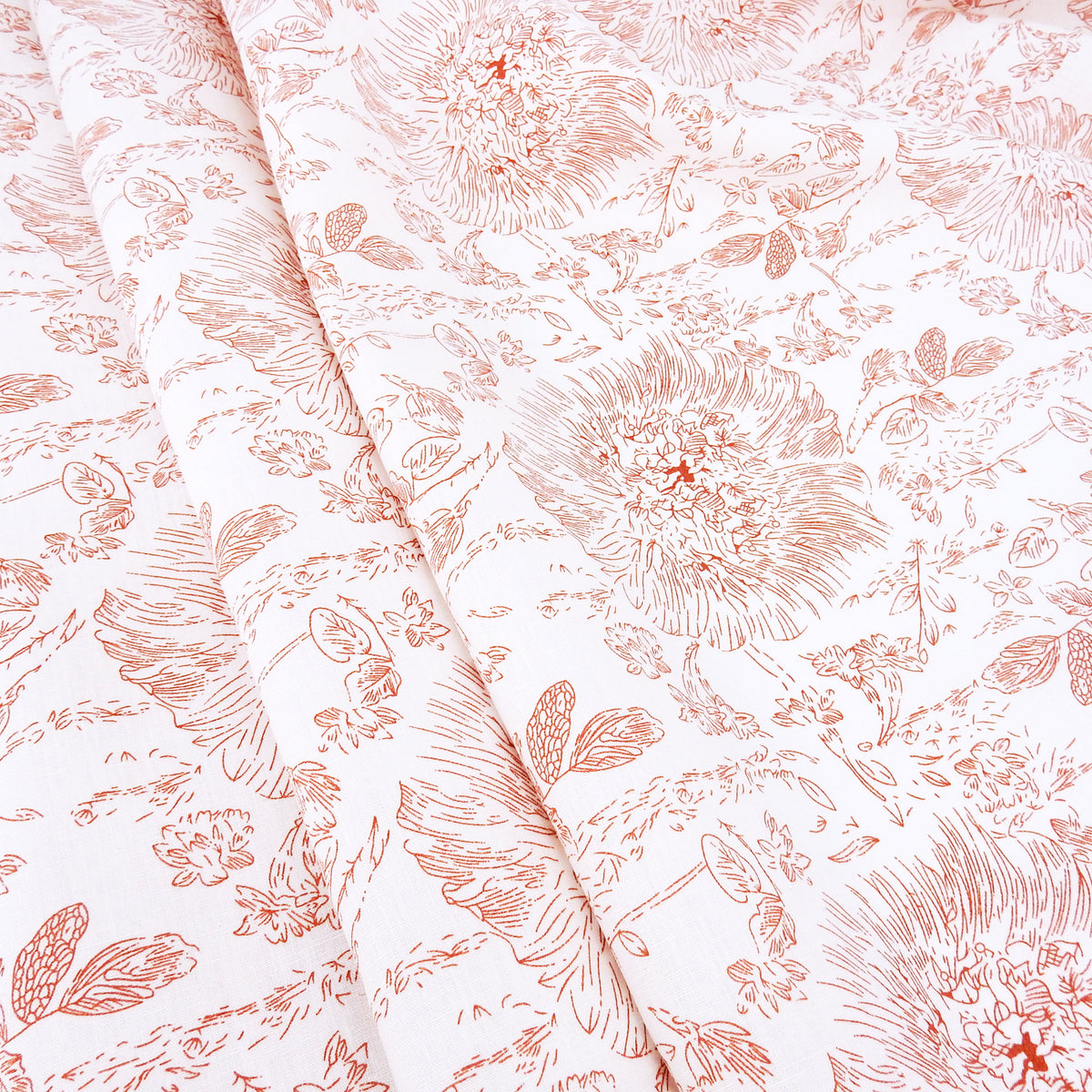 Premium 100% European Linen Printed Toile Floral Fabric. Terracotta Clay & White. mid-weight apparel & high end home decor. shown pleated