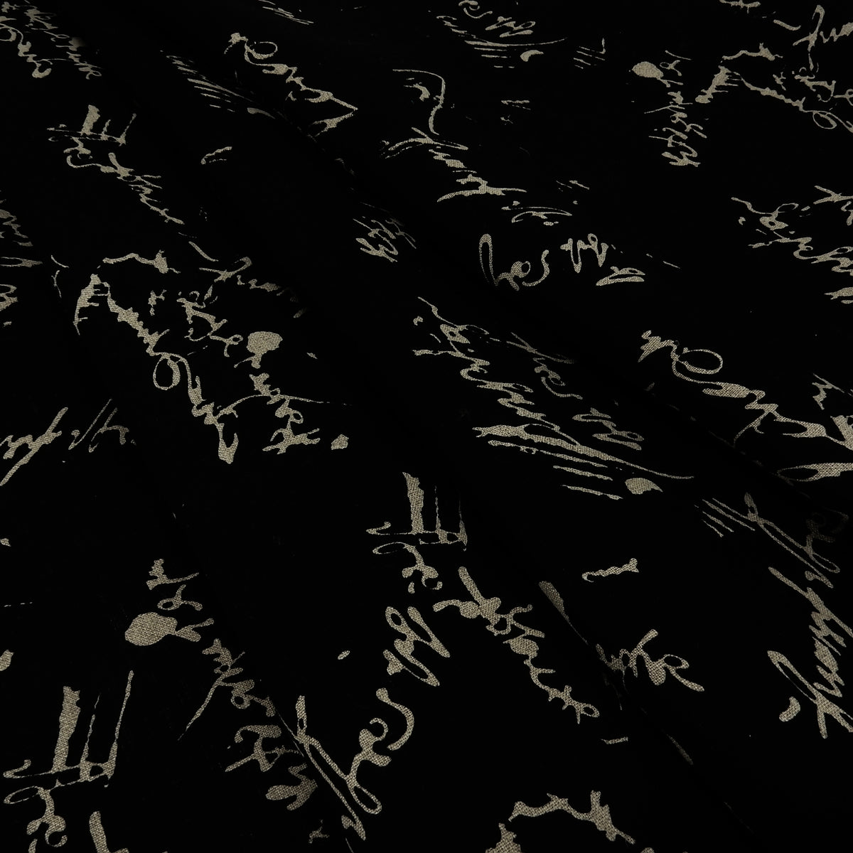 Premium 100% European Linen Printed Script Fabric - Black & Undyed Natural. versatile apparel & high-end home decor. shown lightly gathered