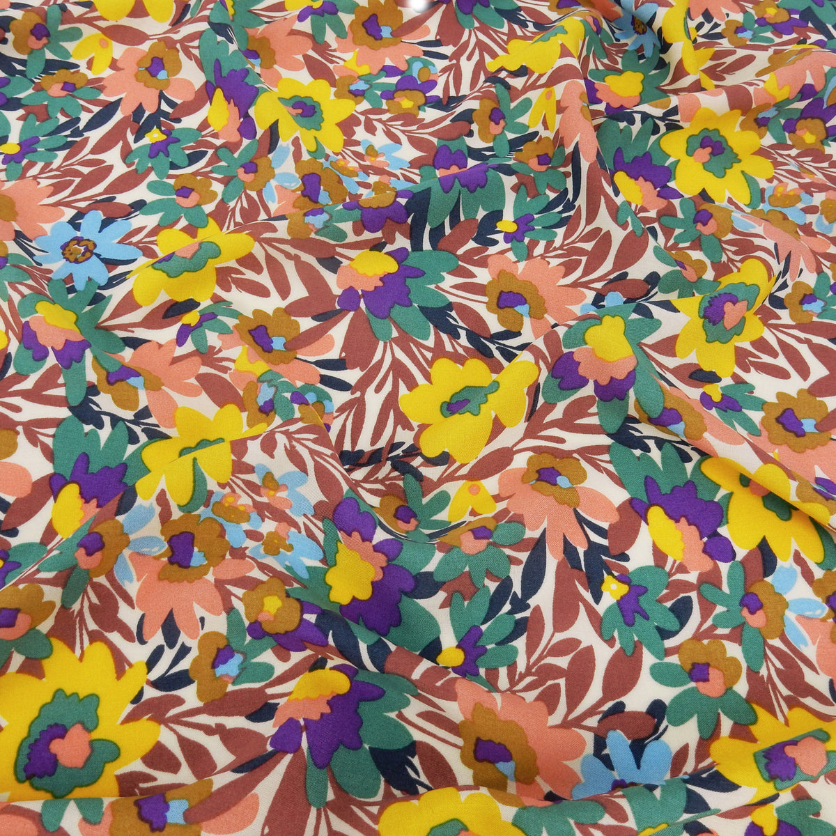 Premium 100% Rayon Challis Fabric. Vibrant Botanical on Creamy White. lightweight & ultra soft. shown lightly gathered