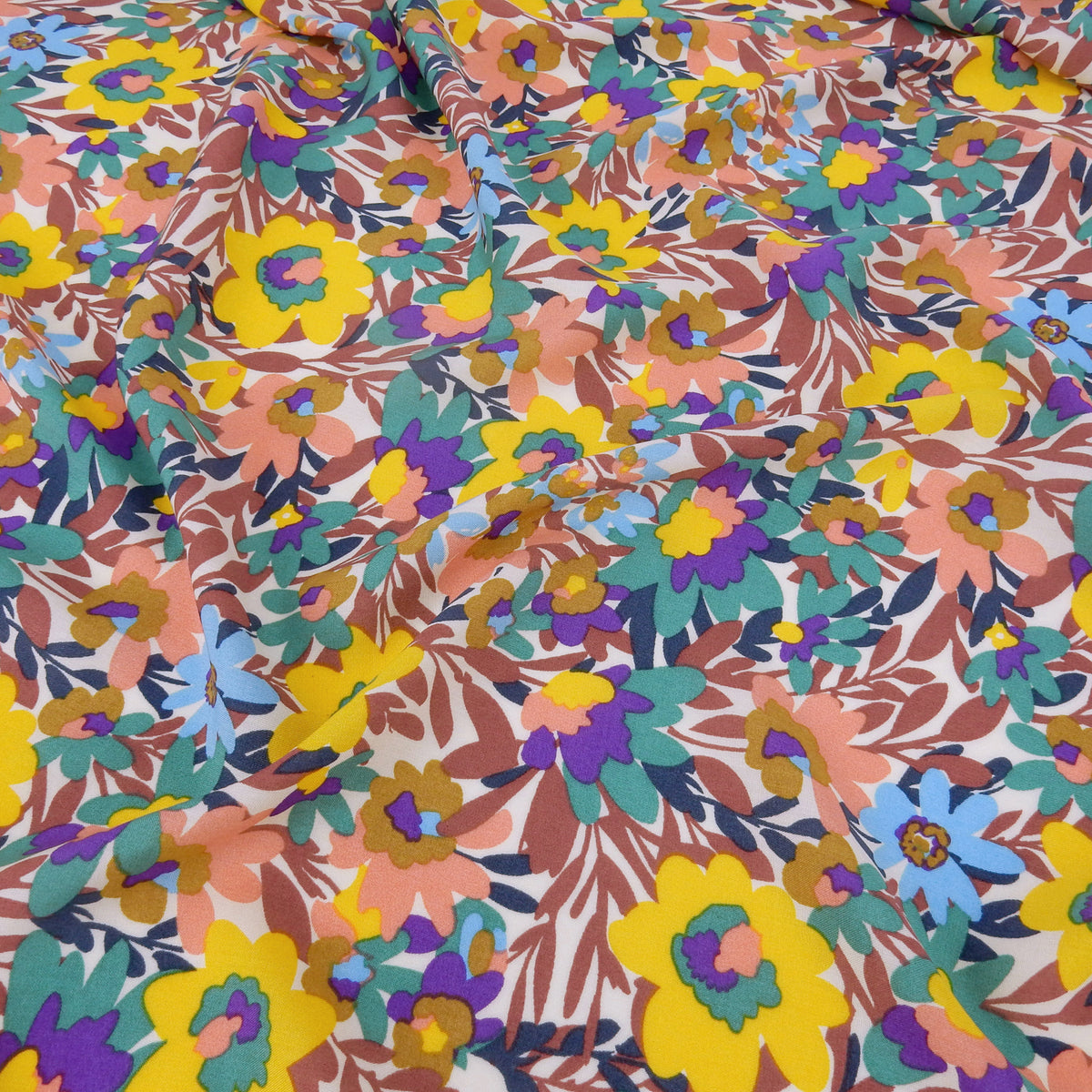 Premium 100% Rayon Challis Fabric. Vibrant Botanical on Creamy White. lightweight & ultra soft. shown lightly gathered