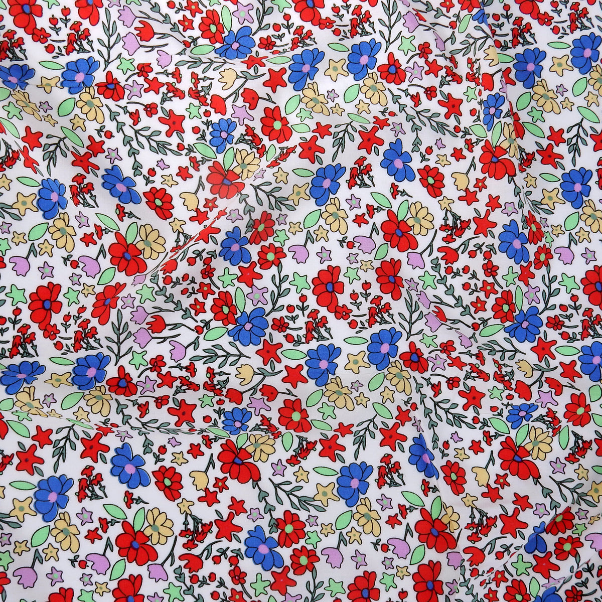 Premium 100% Rayon Challis Fabric. Playful Millefleurs Floral in Red, Periwinkle, Soft Yellow, Lilac & Mint. lightweight & ultra soft. shown flat