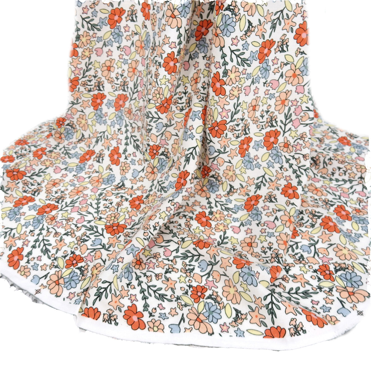 Premium 100% Rayon Challis Fabric. Playful Millefleurs Floral in Burnt Orange, Peach, Dusty Blue, Soft Yellow & Pink. lightweight & ultra soft. shown draped