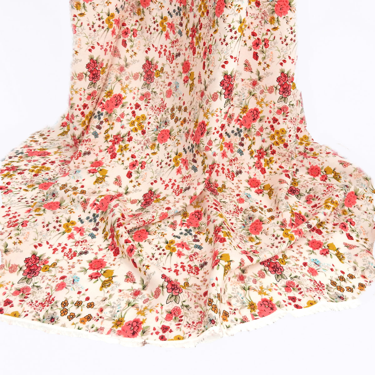 Premium 100% Rayon Challis Fabric. Playful Millefleurs Floral in Red Rose, Gold & Sky Blue on Pale Pink background. lightweight & ultra soft. shown draped