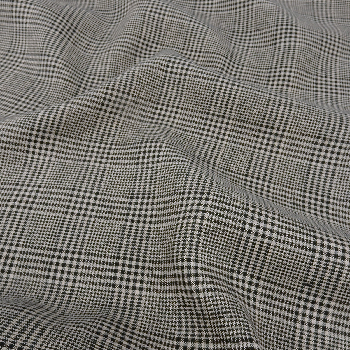 Premium 100% European Linen Yarn Dyed Plaid Fabric. Black & Gray. mid-weight apparel & high end home decor. shown lightly gathered