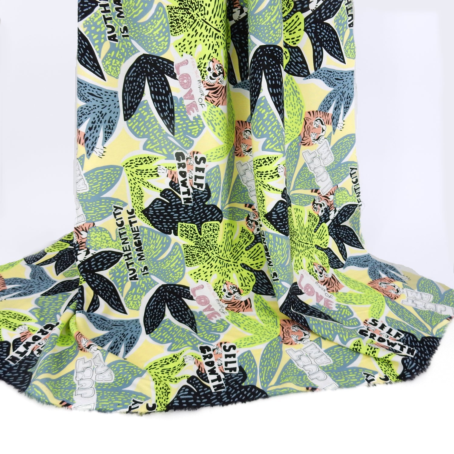 Premium 100% Rayon Challis Fabric. African-inspired print Lime Green. light weight, ultra soft, silk like texture. shown draped
