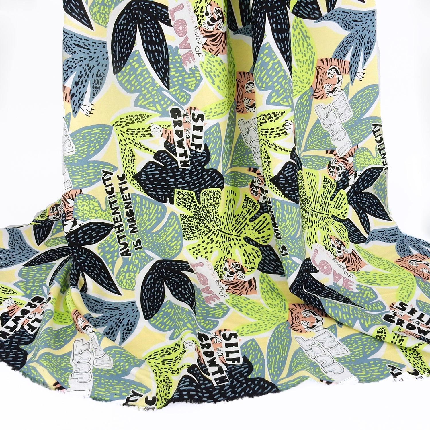 Premium 100% Rayon Challis Fabric. African-inspired print Lime Green. light weight, ultra soft, silk like texture. shown draped