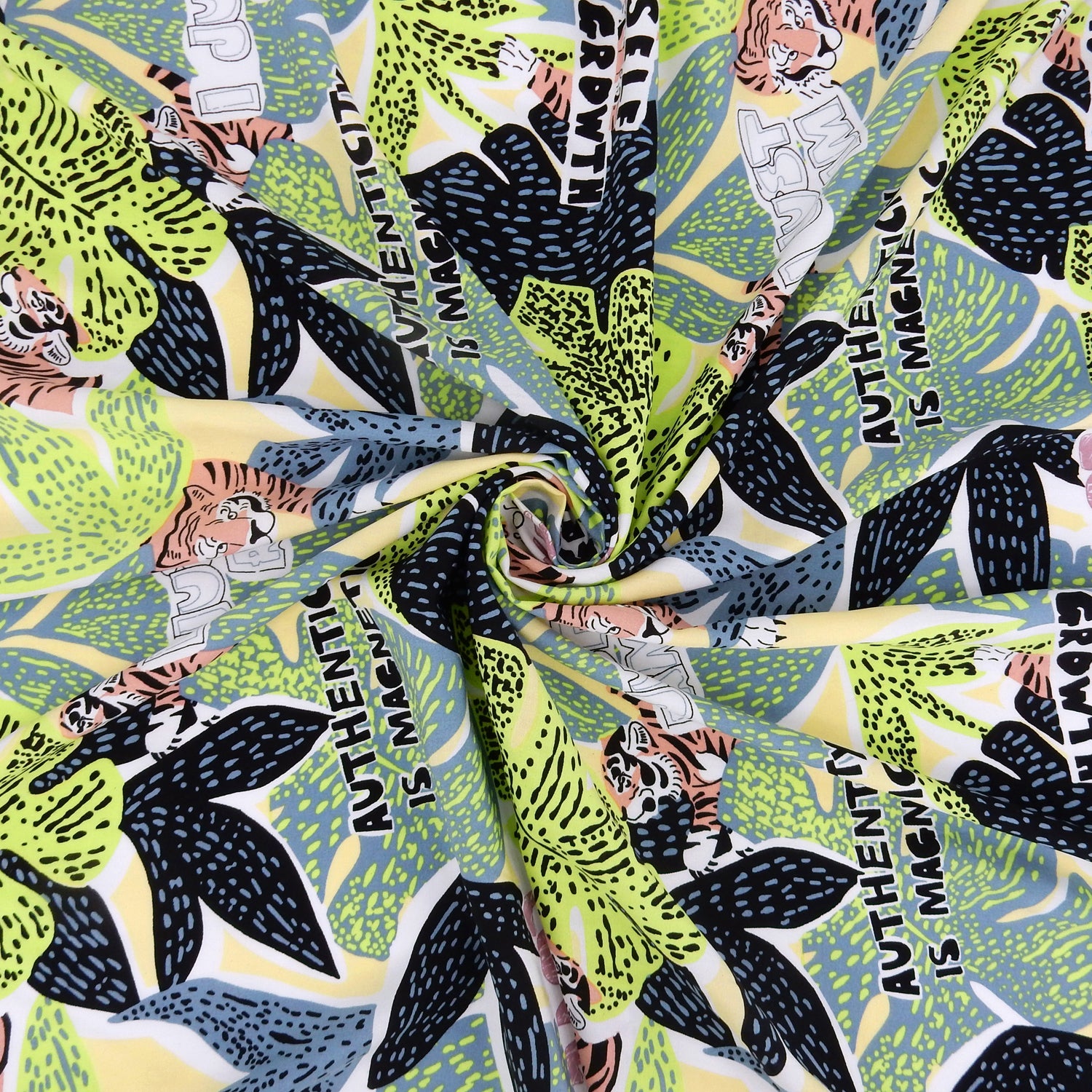 Premium 100% Rayon Challis Fabric. African-inspired print Lime Green. light weight, ultra soft, silk like texture. shown swirled