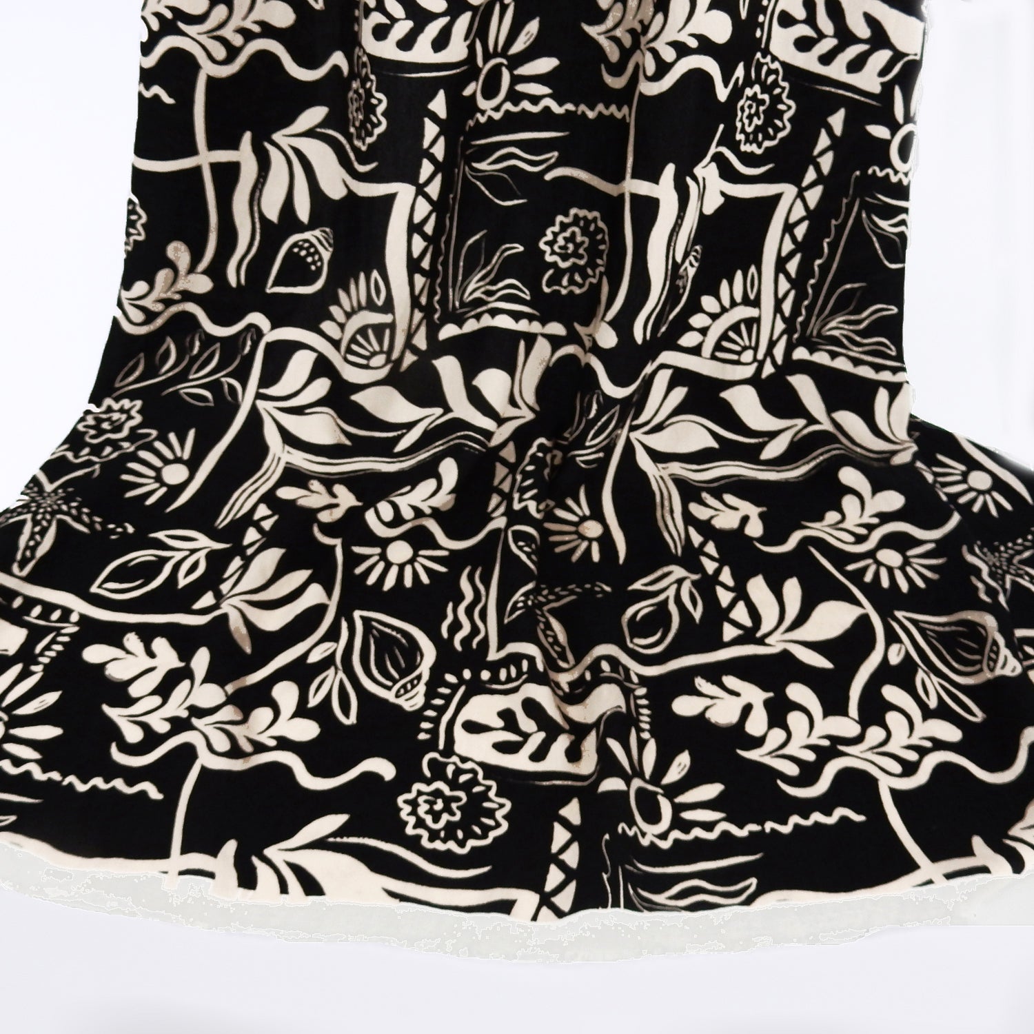 Premium 100% Rayon Challis Fabric. Hand Block Style Print in Black and Beige. Light weight, ultra soft, silk like texture. shown draped