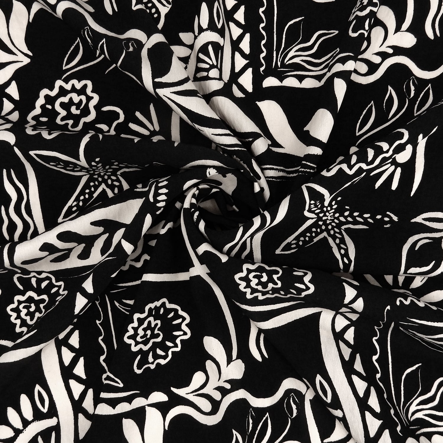 Premium 100% Rayon Challis Fabric. Hand Block Style Print in Black and Beige. Light weight, ultra soft, silk like texture. shown swirled