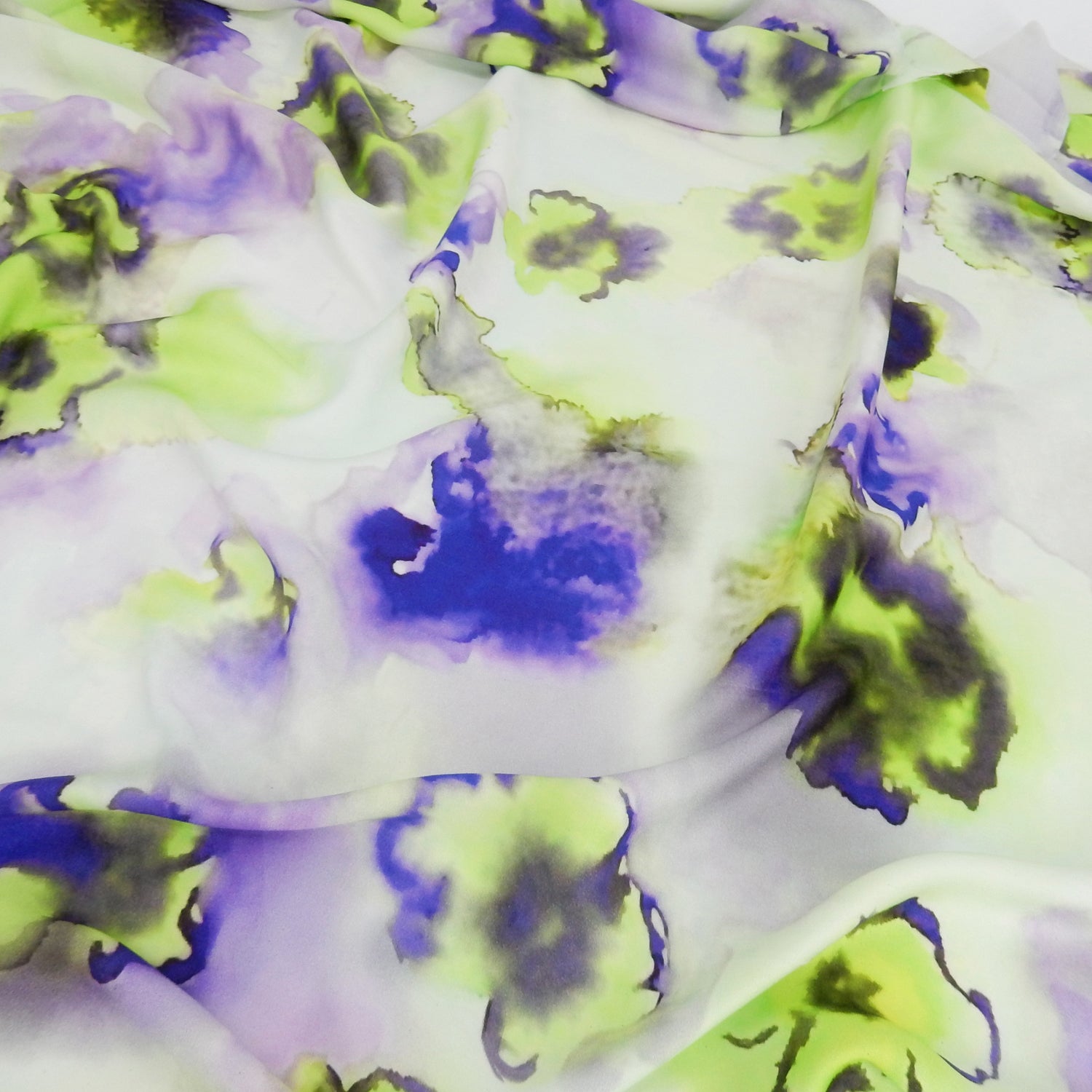 Premium 100% Rayon Challis Fabric. Foral Watercolor Print in Lime Green and purple. lightweight, ultra soft, silk like texture. shown lightly gathered