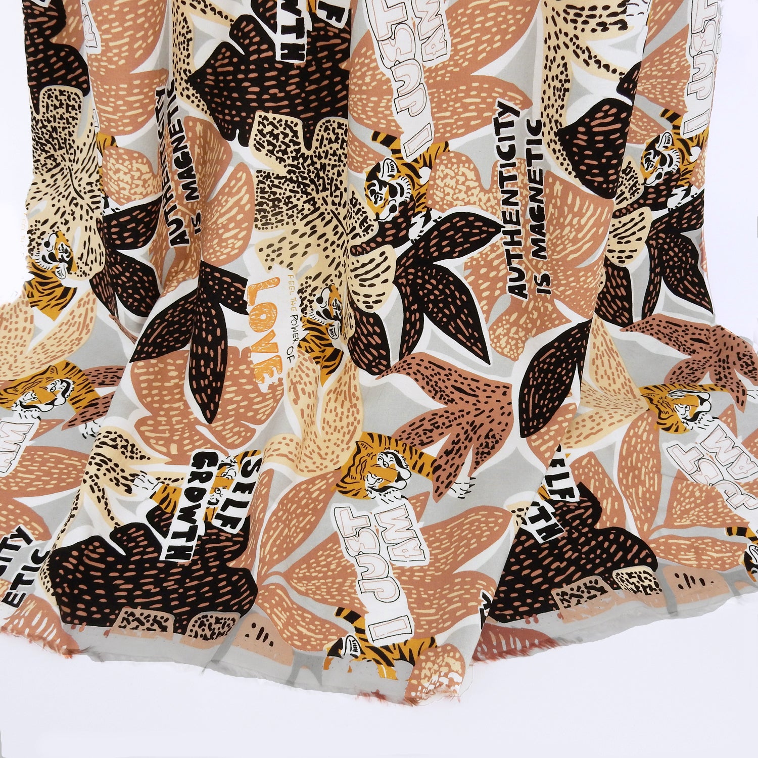 Premium 100% Rayon Challis Fabric. African-inspired print, gray, coral & brown. light weight, ultra soft, silk like texture. shown draped