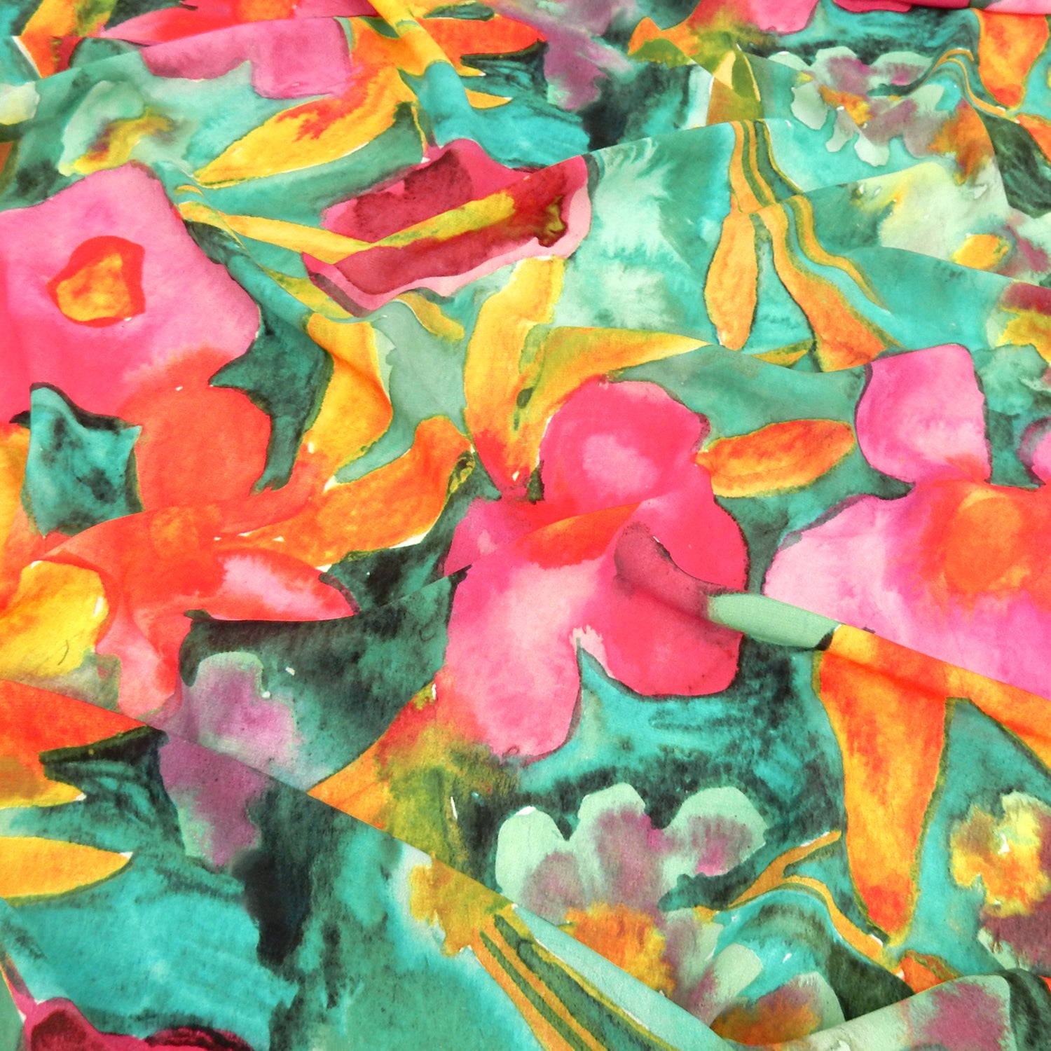 Premium watercolor floral semi-sheer dress fabric. Luxury tropical Bloom design on premium polyester. Shown lightly gathered.