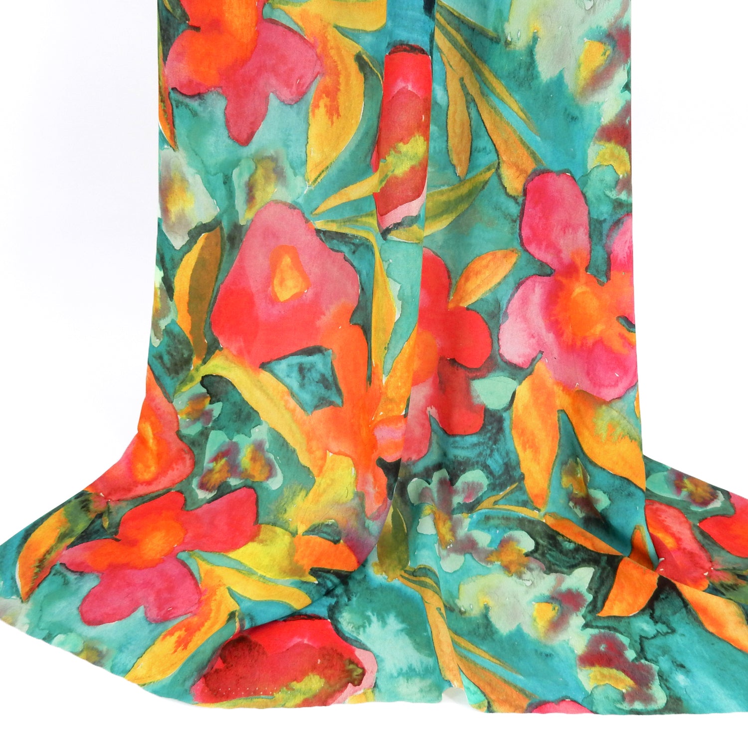 Premium watercolor floral semi-sheer dress fabric. Luxury tropical Bloom design on premium polyester. Shown draped