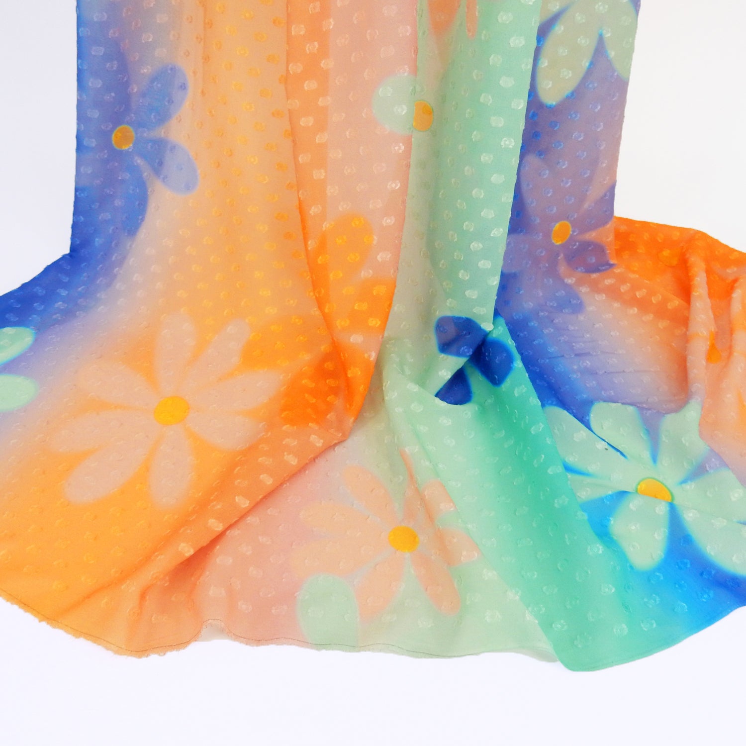 Premium floral printed clip dot fabric. semi sheer with raised clip dots. Modern flower design on multicolor railroad stripe. shown draped