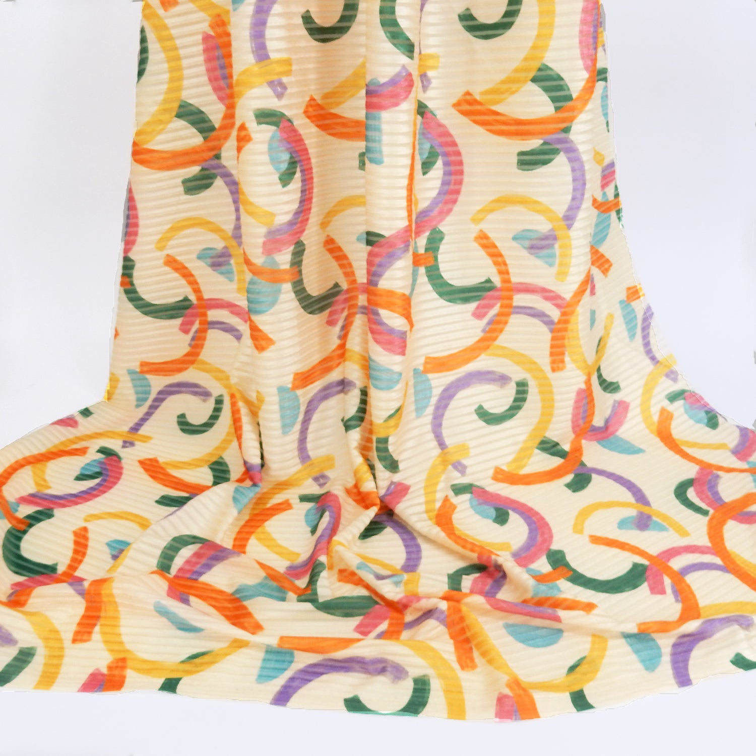 Premium Spanish Geometric Burnout Stretch Velvet fabric.  Pastel Multi-Color & Ivory rectangle & square design on 4-way stretch burnout velvet. shown draped