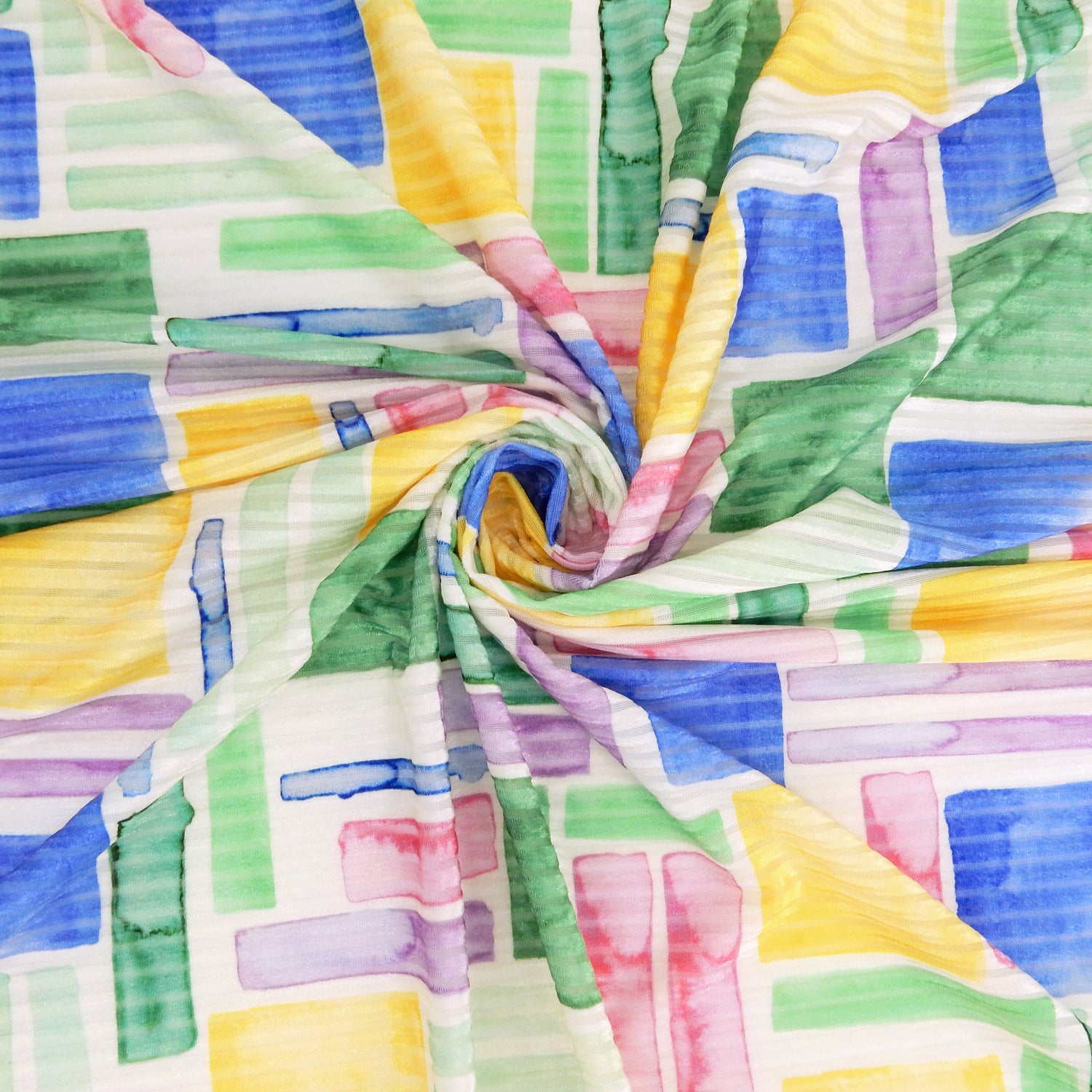 Premium Spanish Geometric Burnout Stretch Velvet fabric.  Pastel Multi-Color & Ivory rectangle & square design on 4-way stretch burnout velvet. shown swirled
