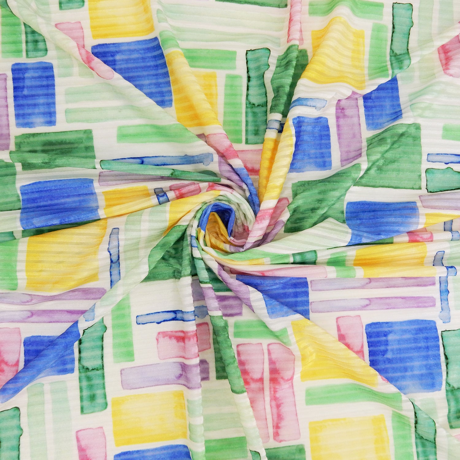 Premium Spanish Geometric Burnout Stretch Velvet fabric.  Pastel Multi-Color & Ivory rectangle & square design on 4-way stretch burnout velvet. shown swirled