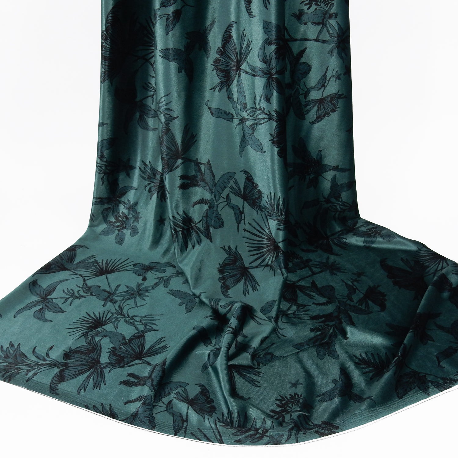 Premium Spanish minimalist floral stretch velvet dress fabric. Luxury Tone-on-Tone Teal design on polyester  spandex velvet. Shown draped