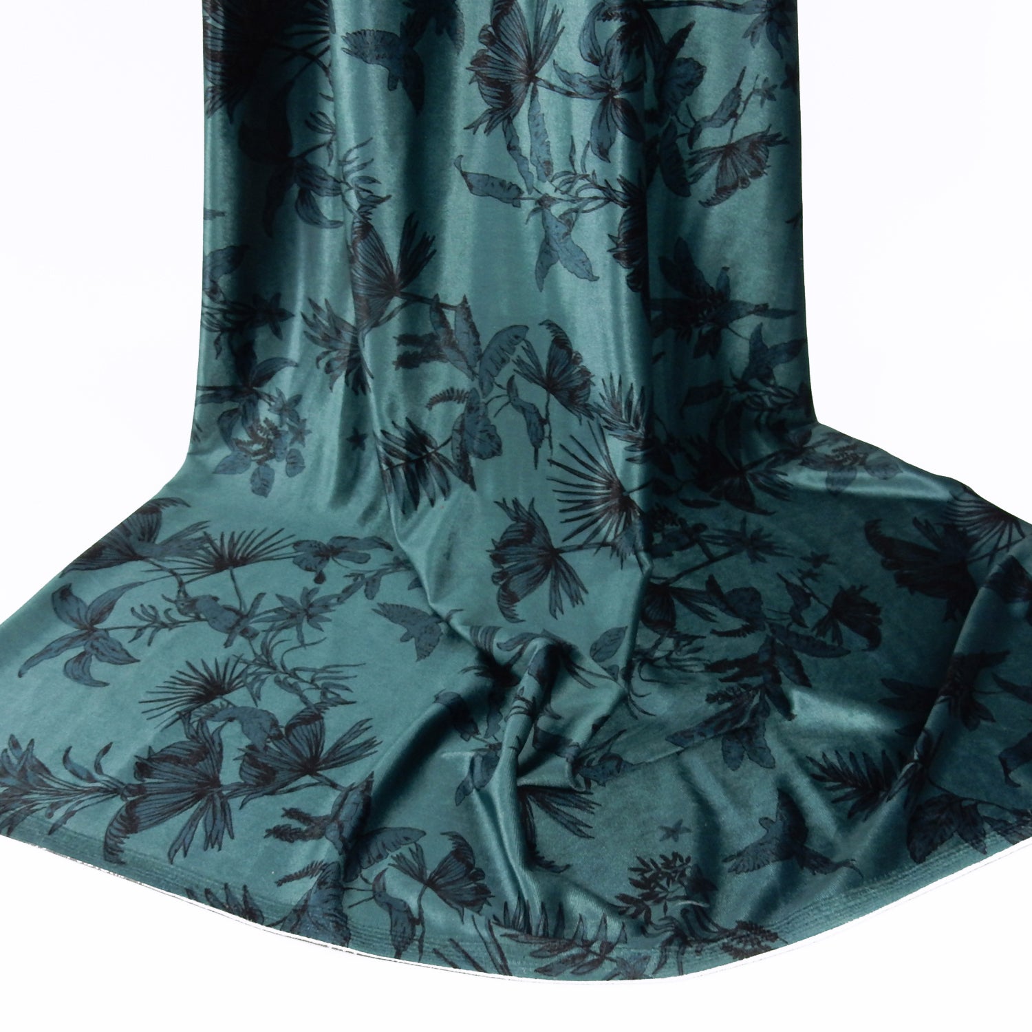 Premium Spanish minimalist floral stretch velvet dress fabric. Luxury Tone-on-Tone Teal design on polyester  spandex velvet. Shown draped