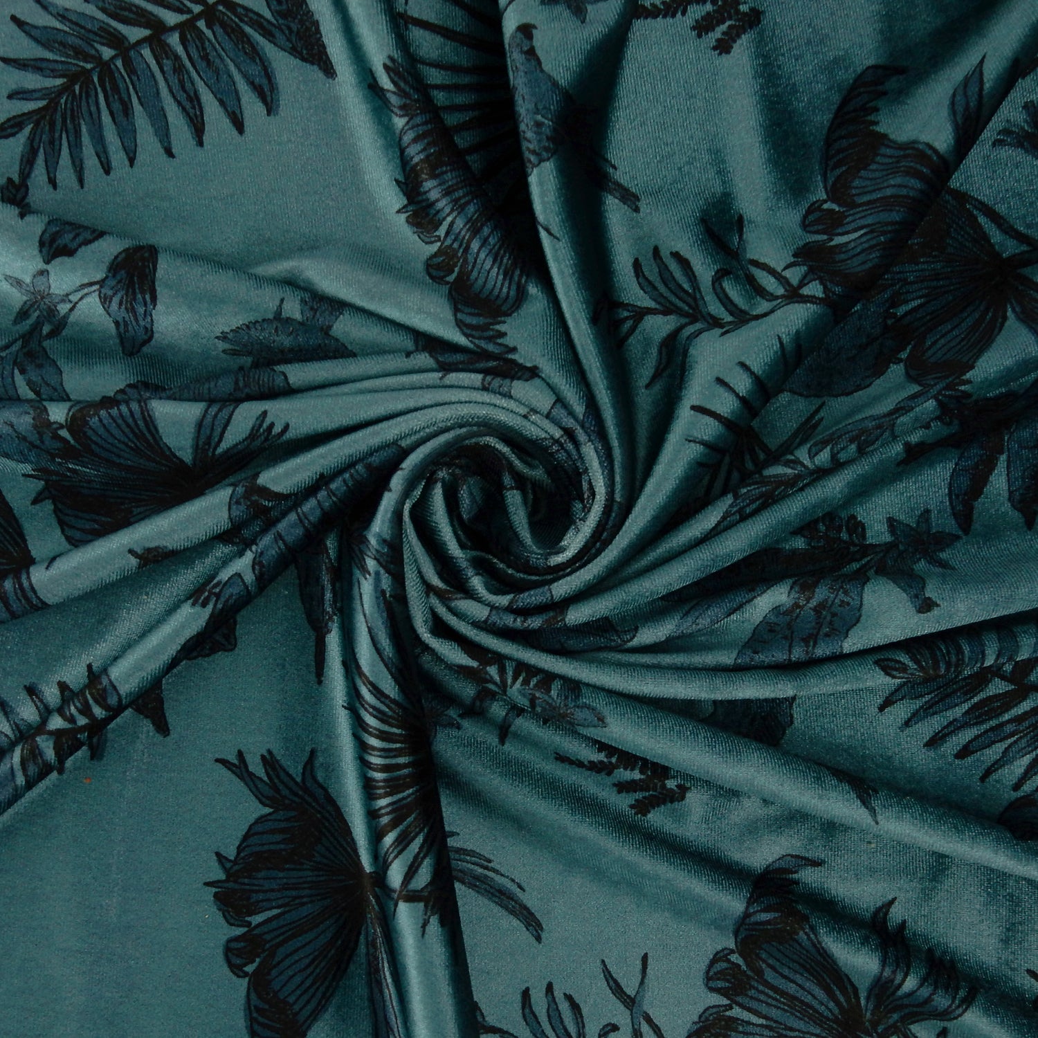 Premium Spanish minimalist floral stretch velvet dress fabric. Luxury Tone-on-Tone Teal design on polyester  spandex velvet. Shown swirled