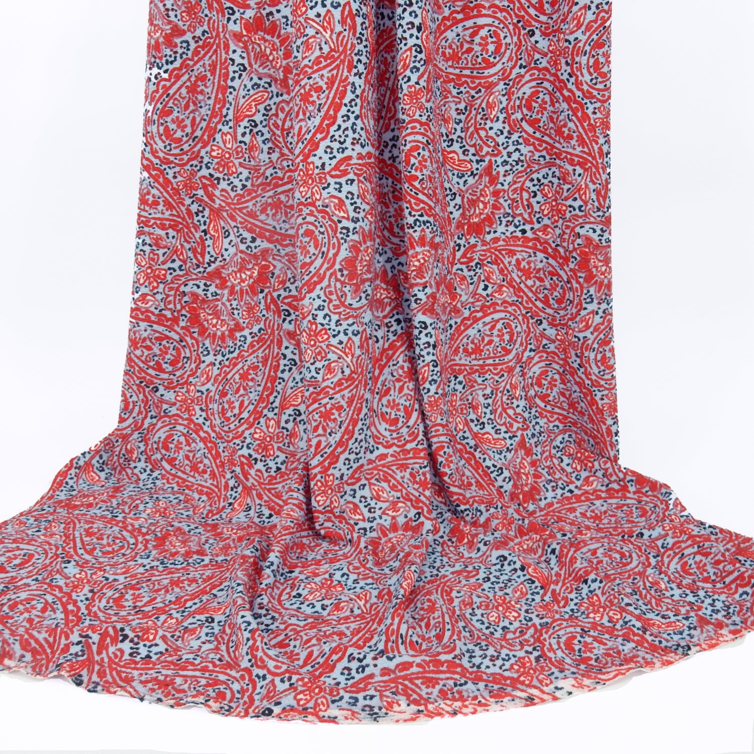 Premium  textured stretch jacquard dress fabric. Luxury lightweight polyester spandex blend. Red & sky blue paisley design. shown draped.