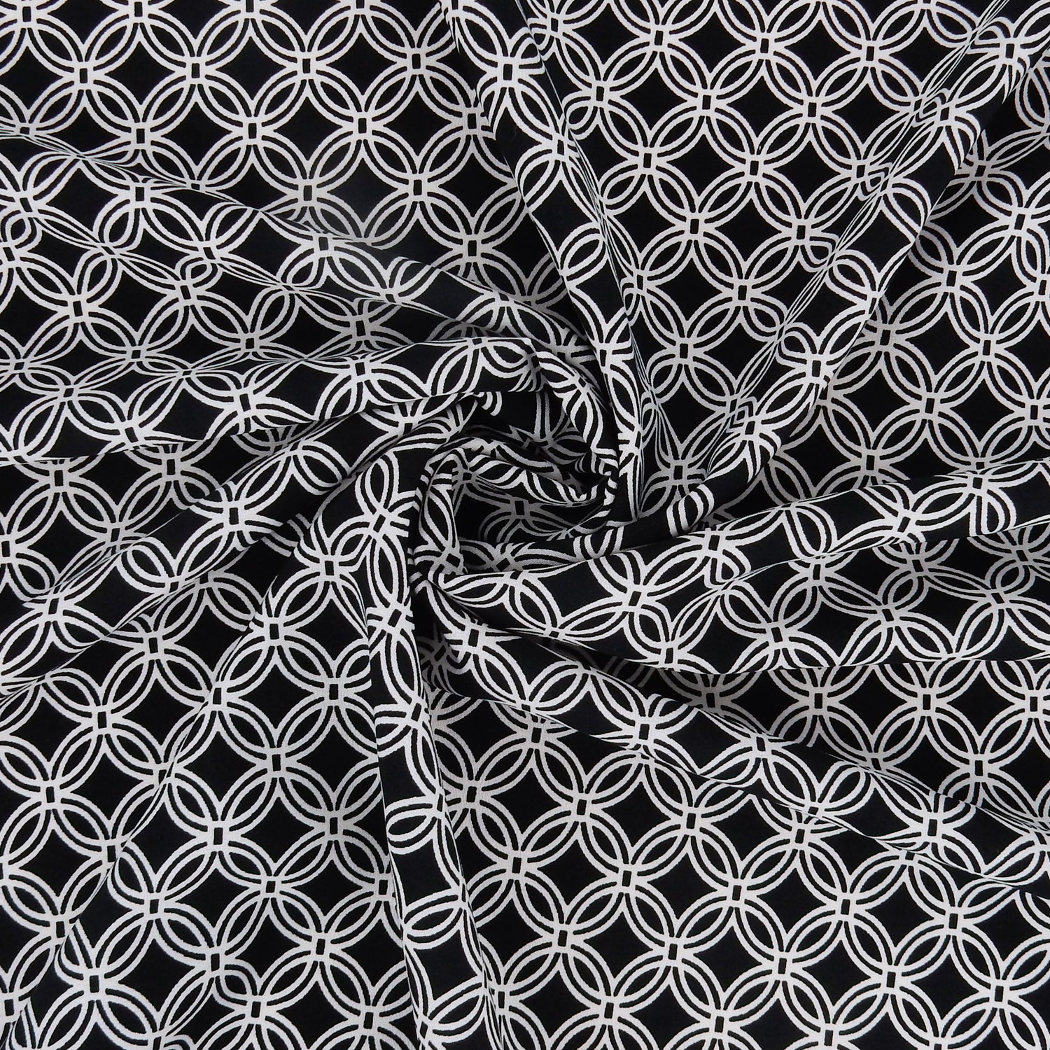 Black & White Geometric Circular Grid – Silky Smooth Stretch Dress Fabric CLF1-856