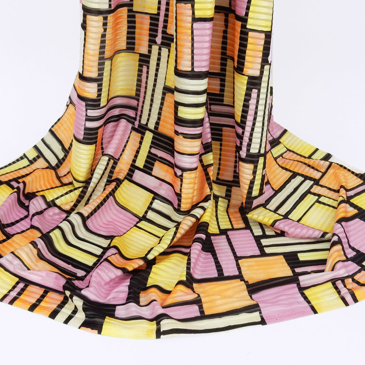 Premium Spanish Geometric Burnout Stretch Velvet fabric. Lemon Yellow, Soft Orange, Paris Pink, Ivory & Black. 4-way stretch. shown draped