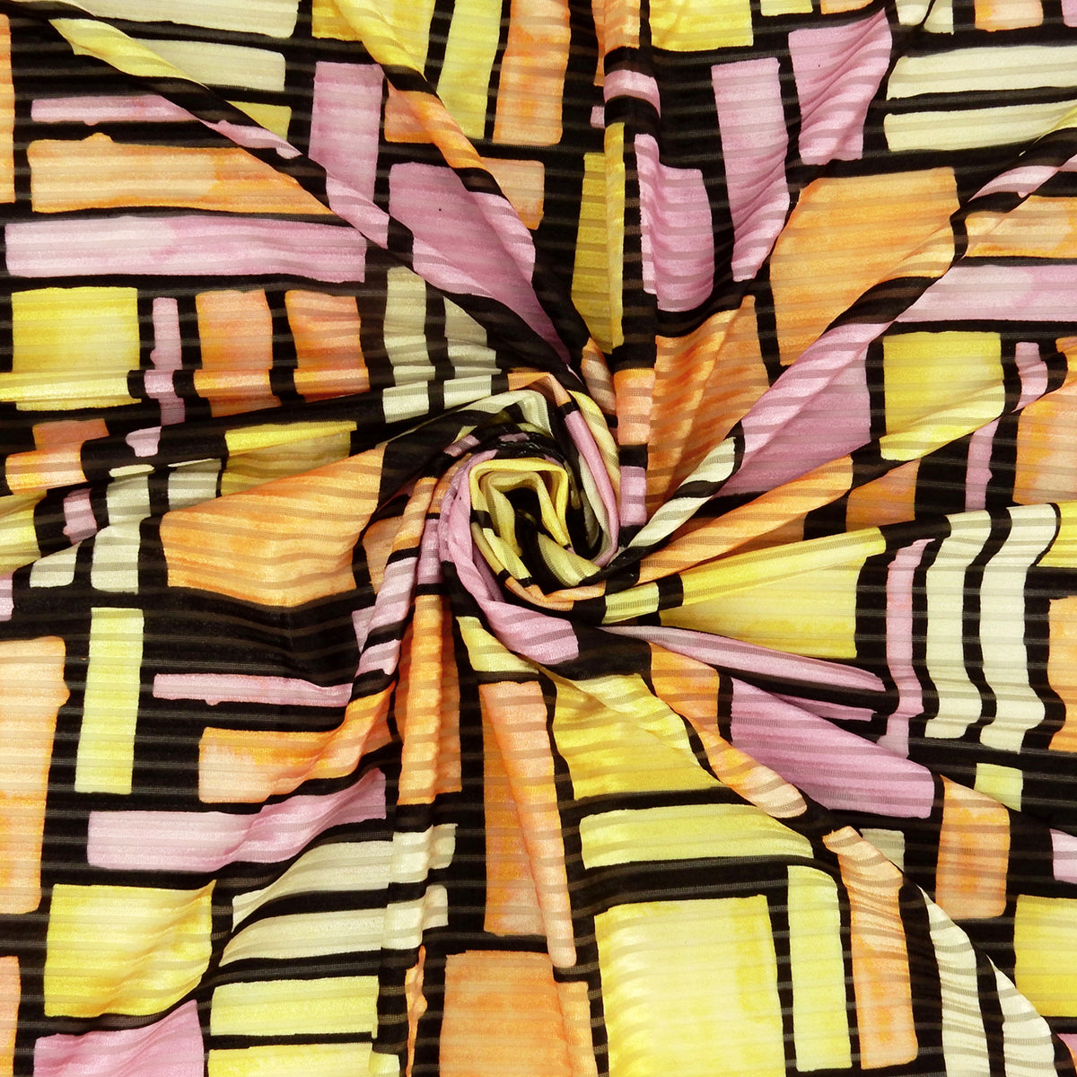 Premium Spanish Geometric Burnout Stretch Velvet fabric. Lemon Yellow, Soft Orange, Paris Pink, Ivory & Black. 4-way stretch. shown swirled