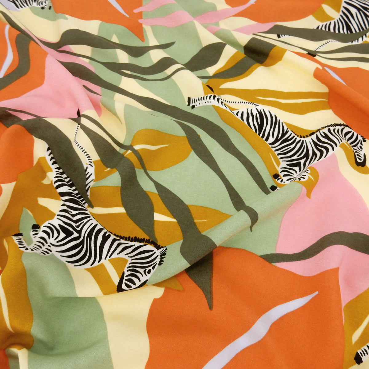 Premium 100% Rayon Challis Fabric. Artistic Zebra Safari Print in Terracotta, Sage & Soft Cream. lightweight & ultra soft. shown lightly gathered