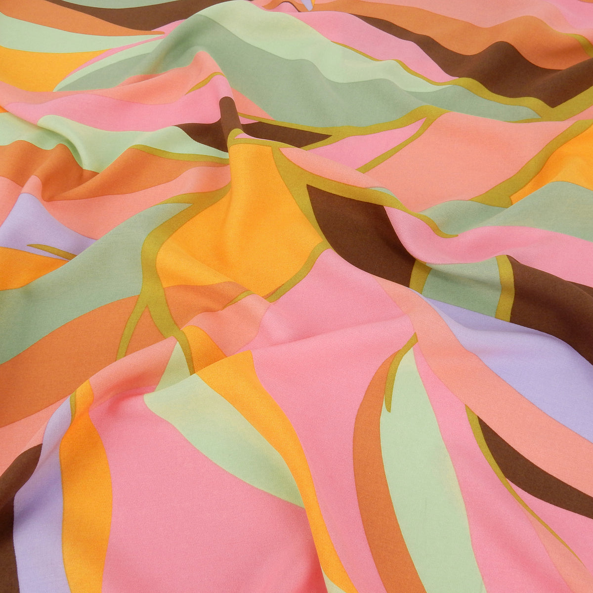 Premium 100% Rayon Challis Fabric. Retro Mod Abstract in Cocoa, Sage & Bold Pink. lightweight & ultra soft. shown lightly gathered
