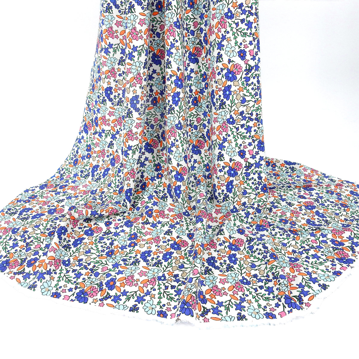Premium 100% Rayon Challis Fabric. Playful Millefleurs Floral in Periwinkle, Berry & Coral. lightweight & ultra soft. shown draped