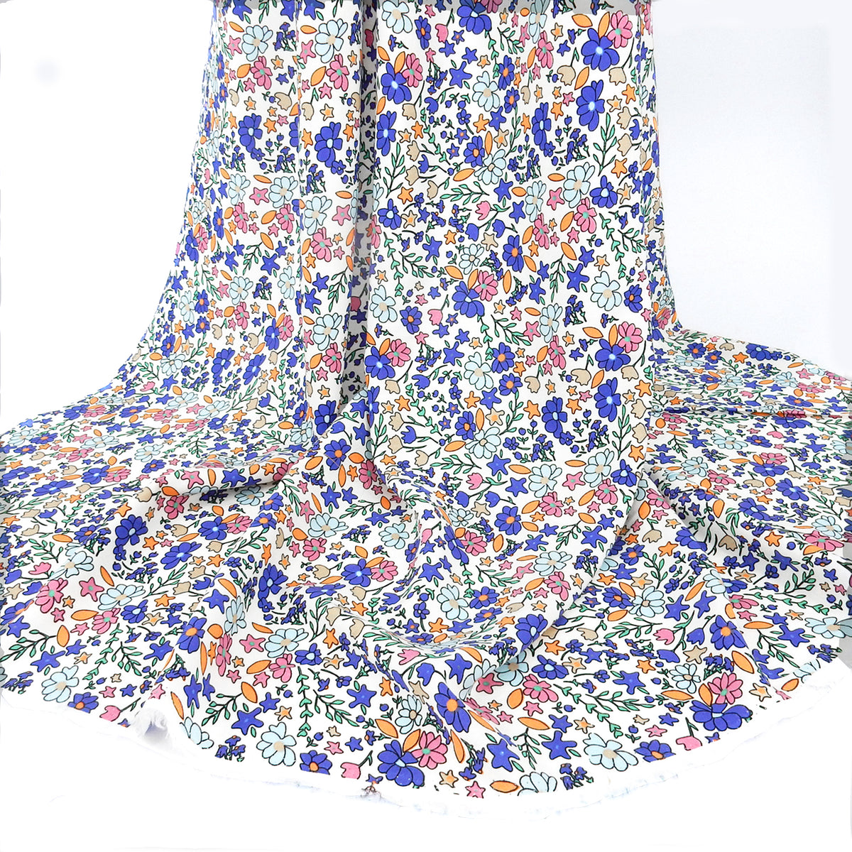 Premium 100% Rayon Challis Fabric. Playful Millefleurs Floral in Periwinkle, Berry & Coral. lightweight & ultra soft. shown draped
