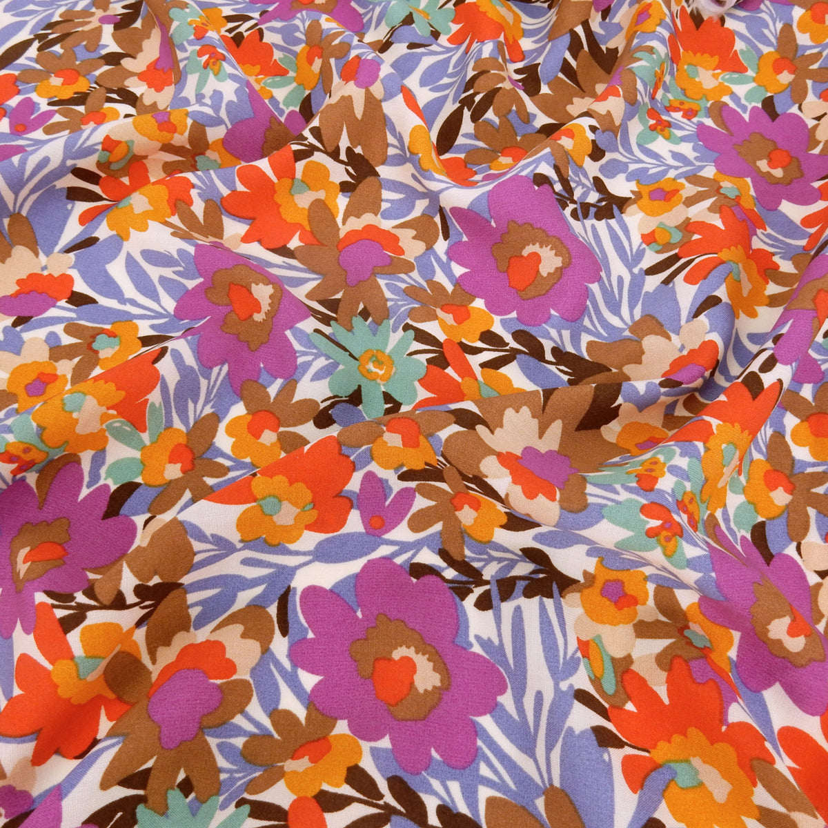 Premium 100% Rayon Challis Fabric. High-Contrast Muted Floral on Creamy White. lightweight & ultra soft. shown lightly gathered